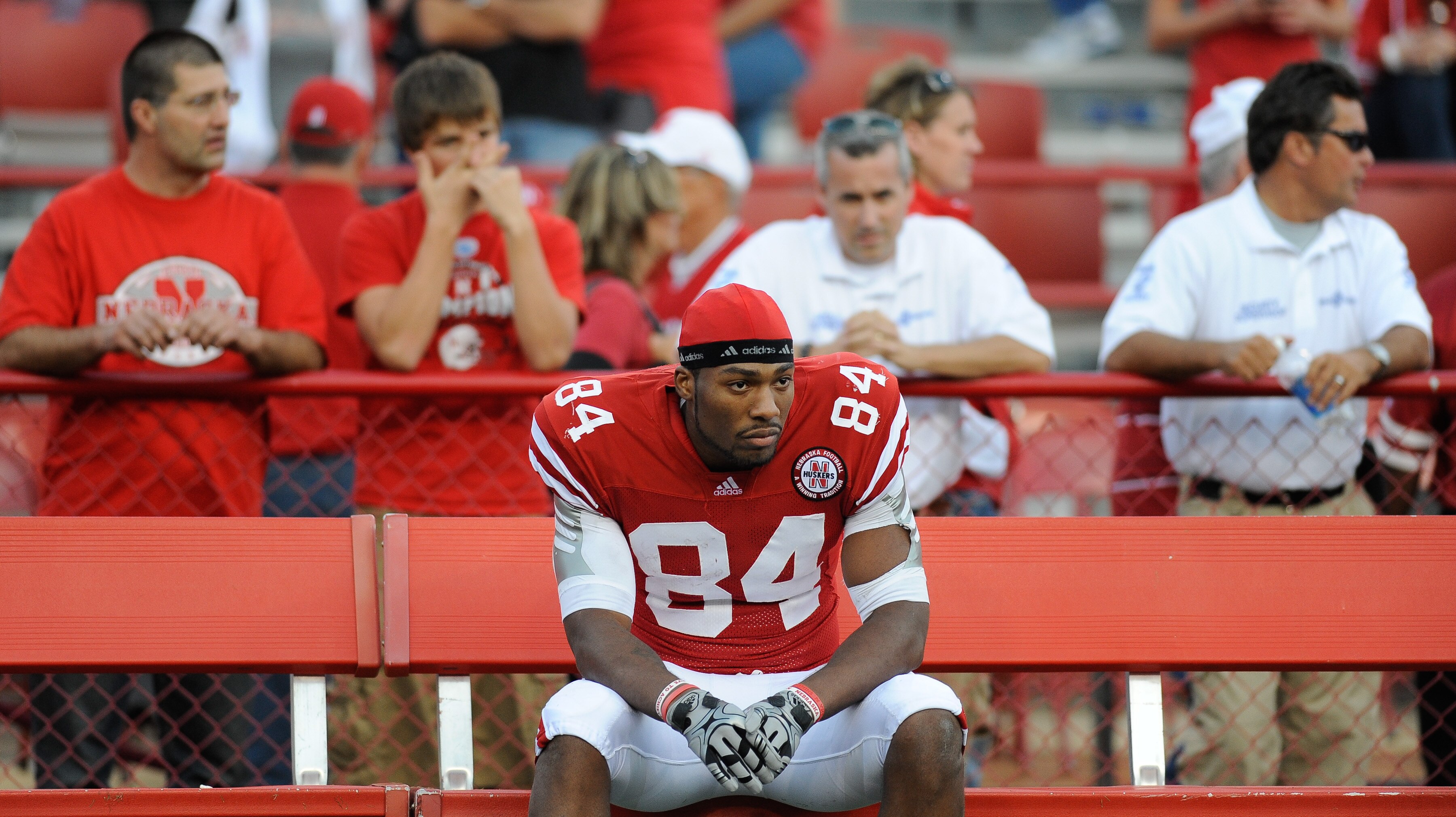 LINCOLN, NE - OCTOBER 16: Wide receiver Brandon Kinnie #84 of the Nebraska Cornhuskers sits dejected after loosing their game with the Texas Longhorns at Memorial Stadium on October 16, 2010 in Lincoln, Nebraska. Texas Defeated Nebraska 20-13. (Photo by E