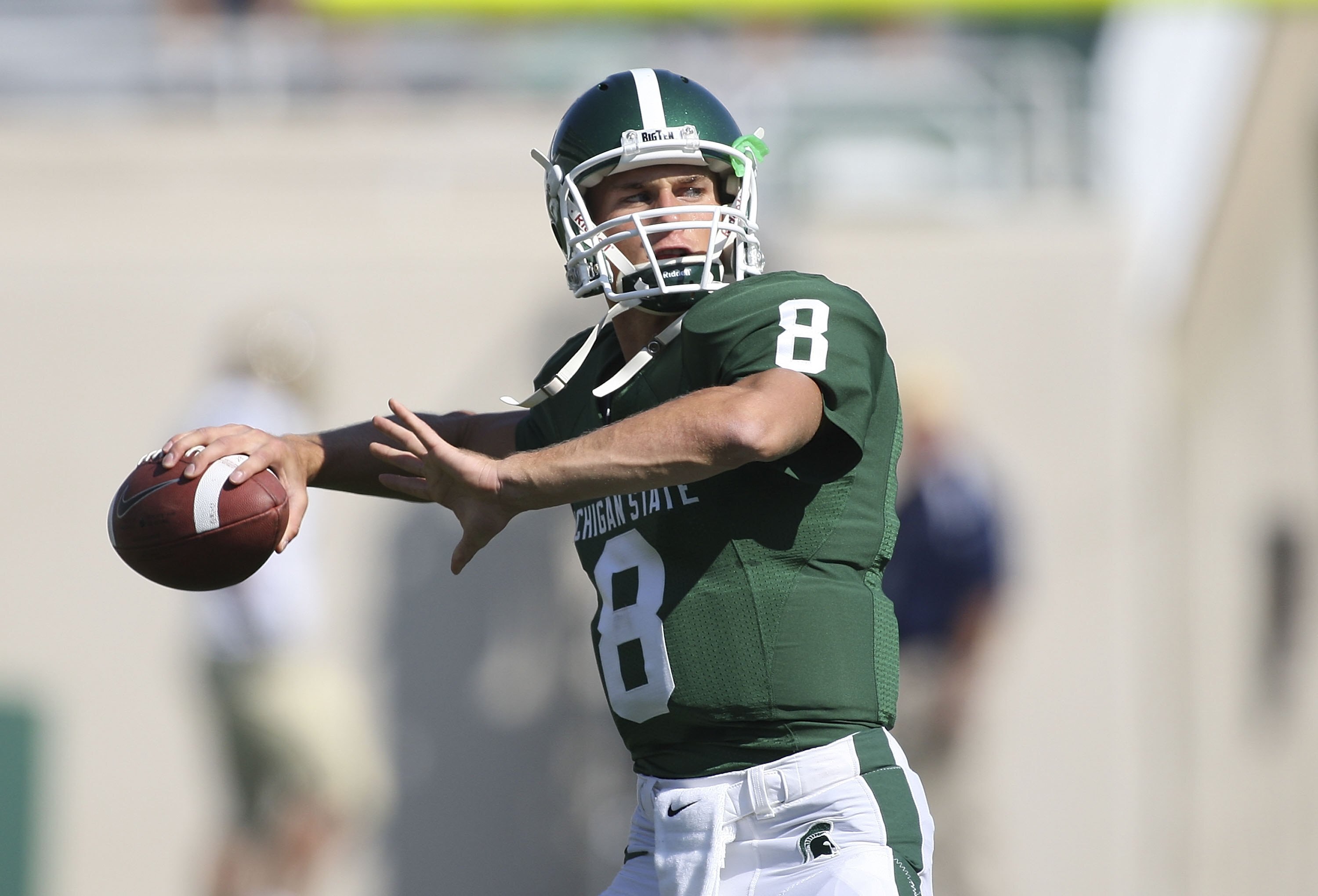 EAST LANSING, MI - SEPTEMBER 05: Quarterback Kirk Cousins #8 of the Michigan State Spartans warms up prior to the start of the game against the Montana State Bobcats on September 5, 2009 at Spartan Stadium in East Lansing, Michigan.  (Photo by Leon Halip/