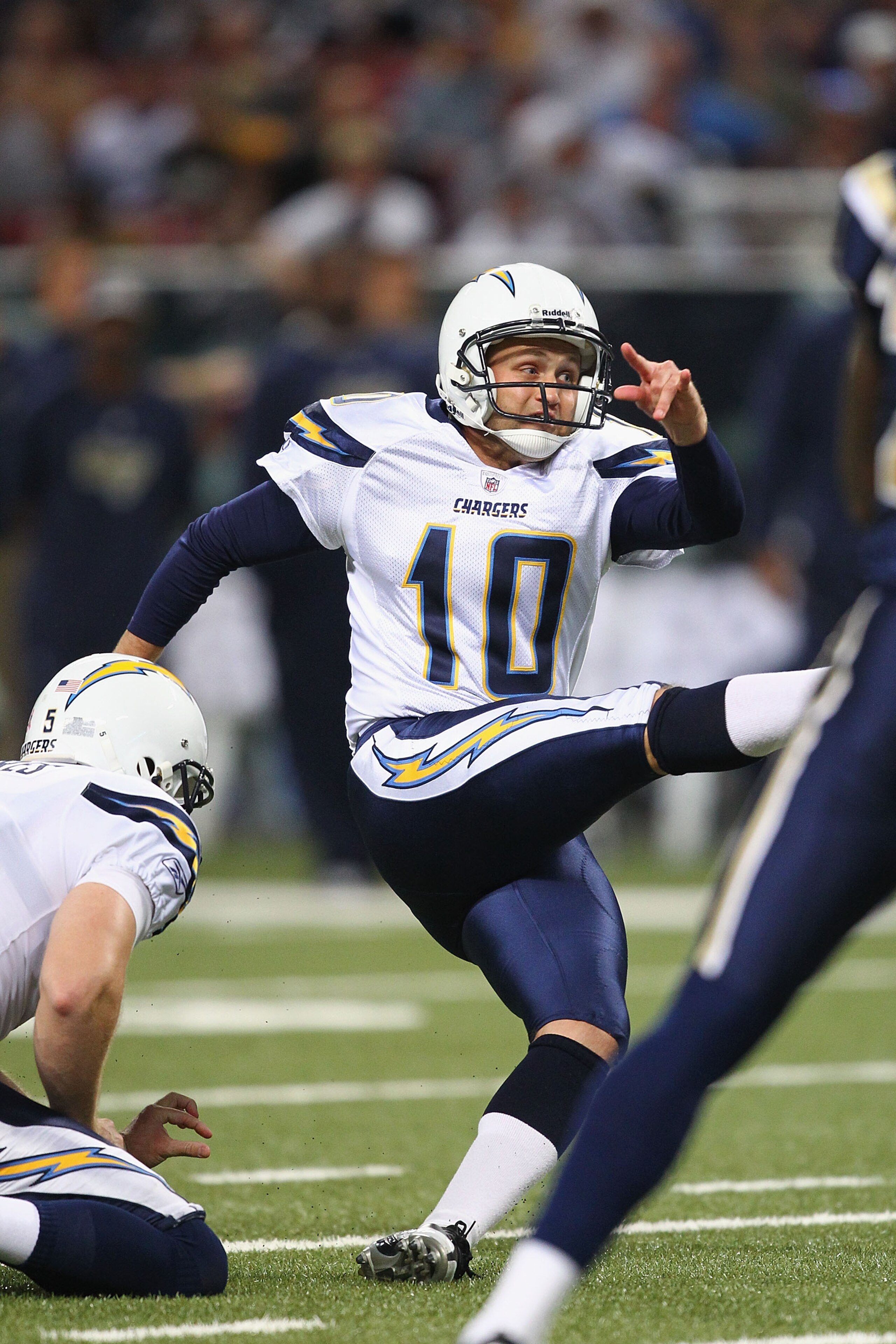 ST. LOUIS - OCTOBER 17: Nate Kaeding #10 of the San Diego Chargers slips as he attempts to kick a field goal against the St. Louis Rams at the Edward Jones Dome on October 17, 2010 in St. Louis, Missouri.  The Rams beat the Chargers 20-17.  (Photo by Dili