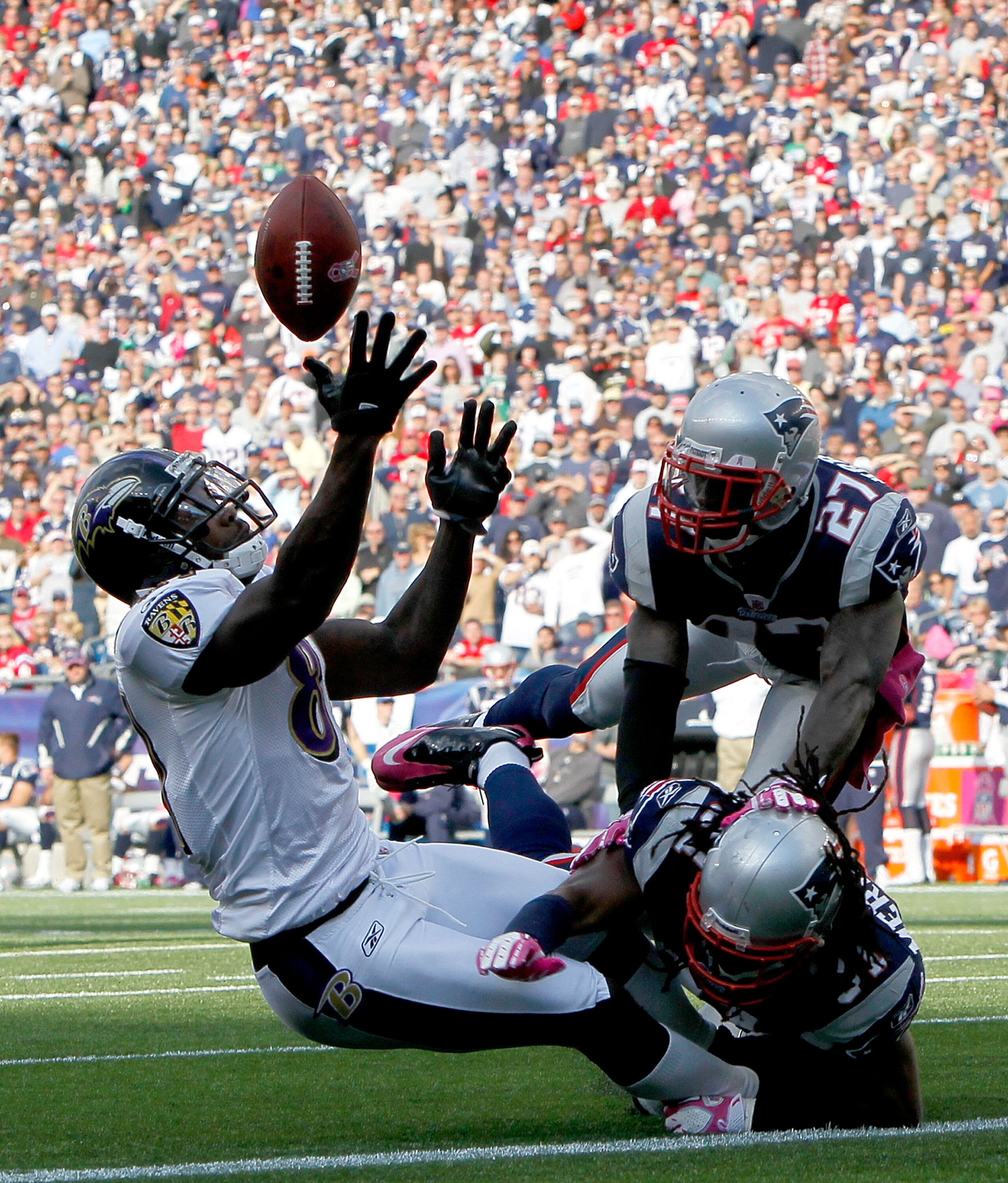 FOXBORO, MA - OCTOBER 17:  Anquan Boldin #81 of the Baltimore Ravens is unable catch the football under the pressure of Brandon Meriweather #31 and Kyle Arrington #27 of the New England Patriots in the second half at Gillette Stadium on October 17, 2010 i