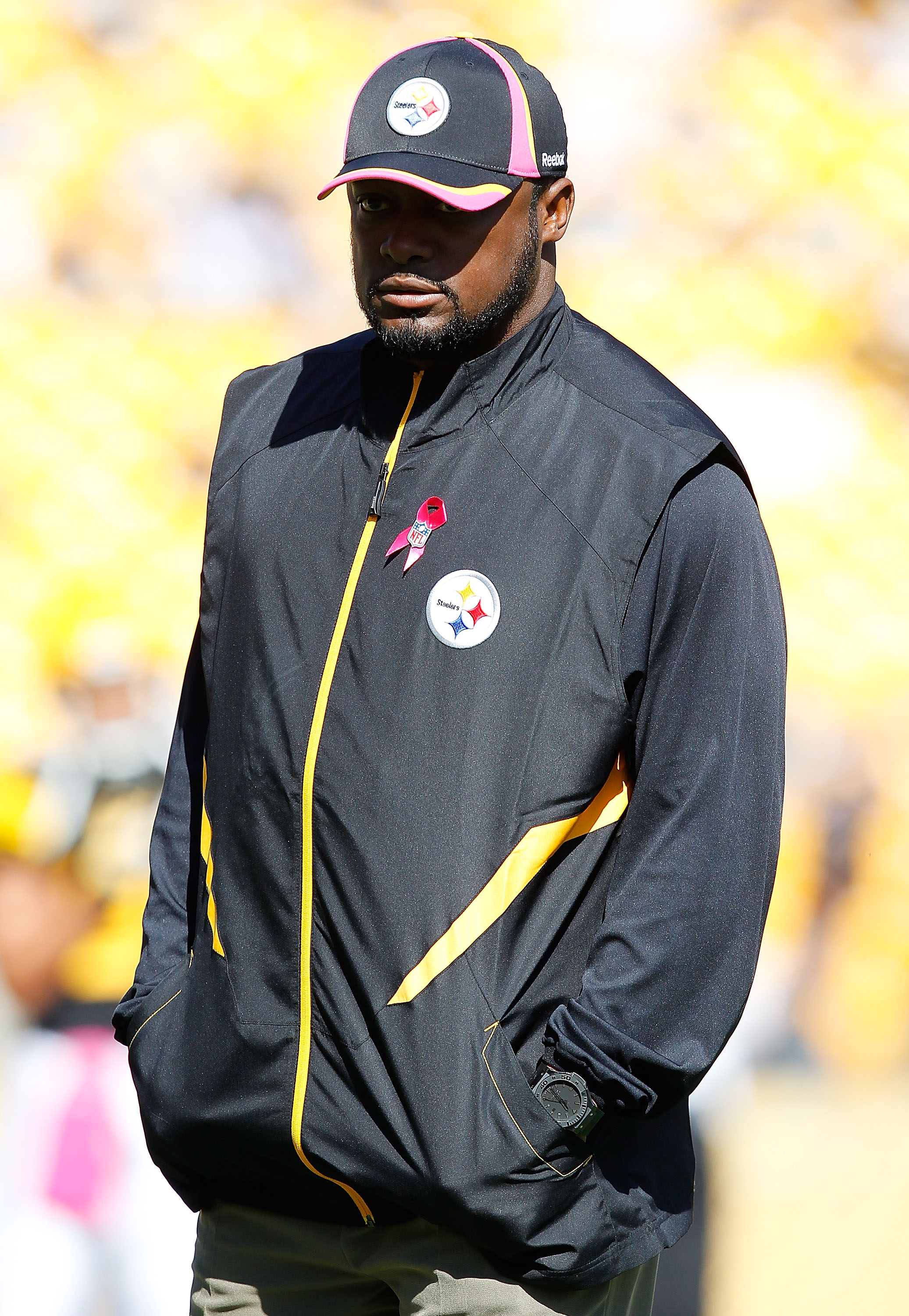 PITTSBURGH - OCTOBER 17:  Head coach Mike Tomlin of the Pittsburgh Steelers watches his team warm up prior to the game against the Cleveland Browns on October 17, 2010 at Heinz Field in Pittsburgh, Pennsylvania.  (Photo by Jared Wickerham/Getty Images)
