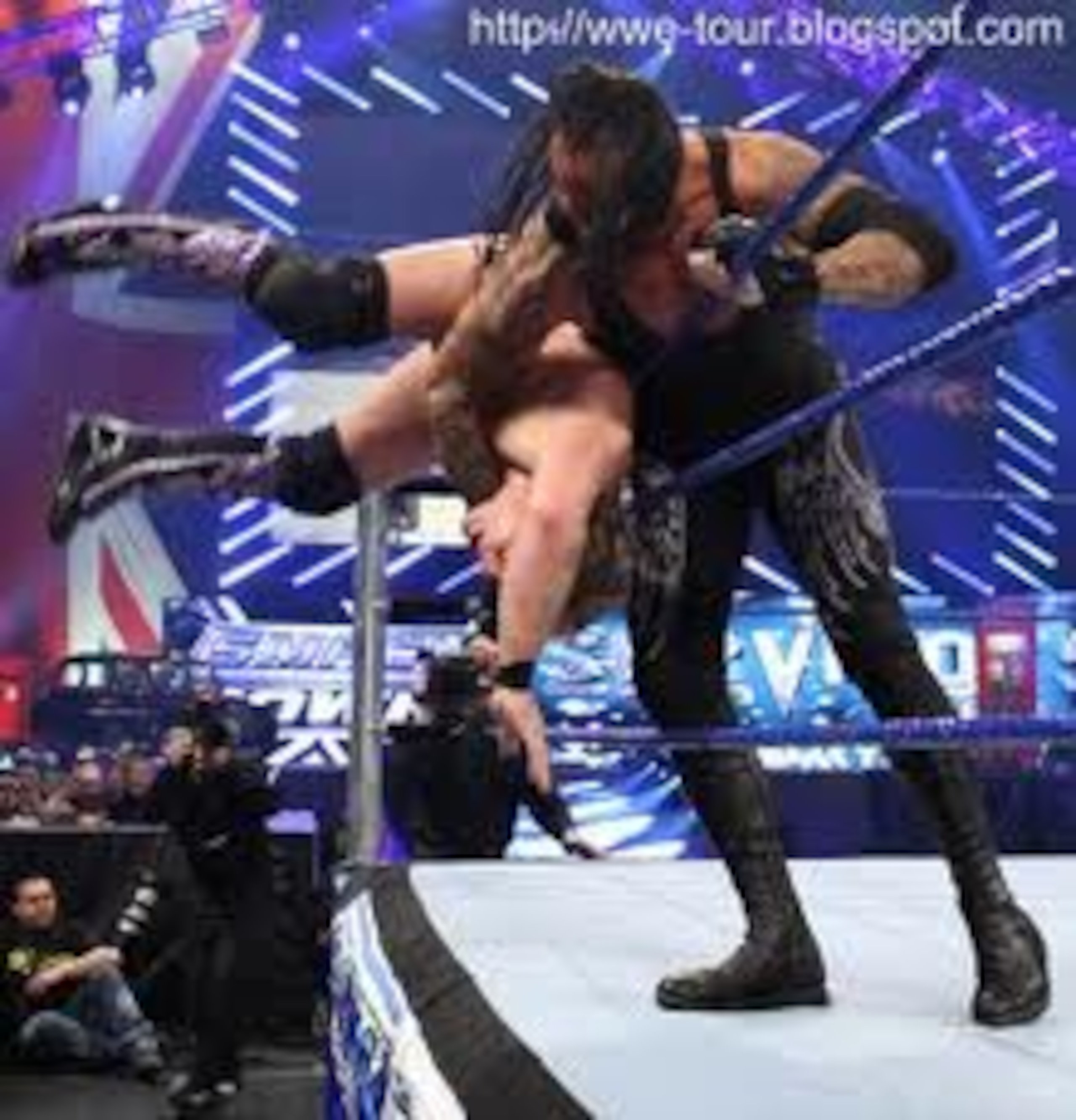 Chris Jericho Takes A Spill Over the Top Rope