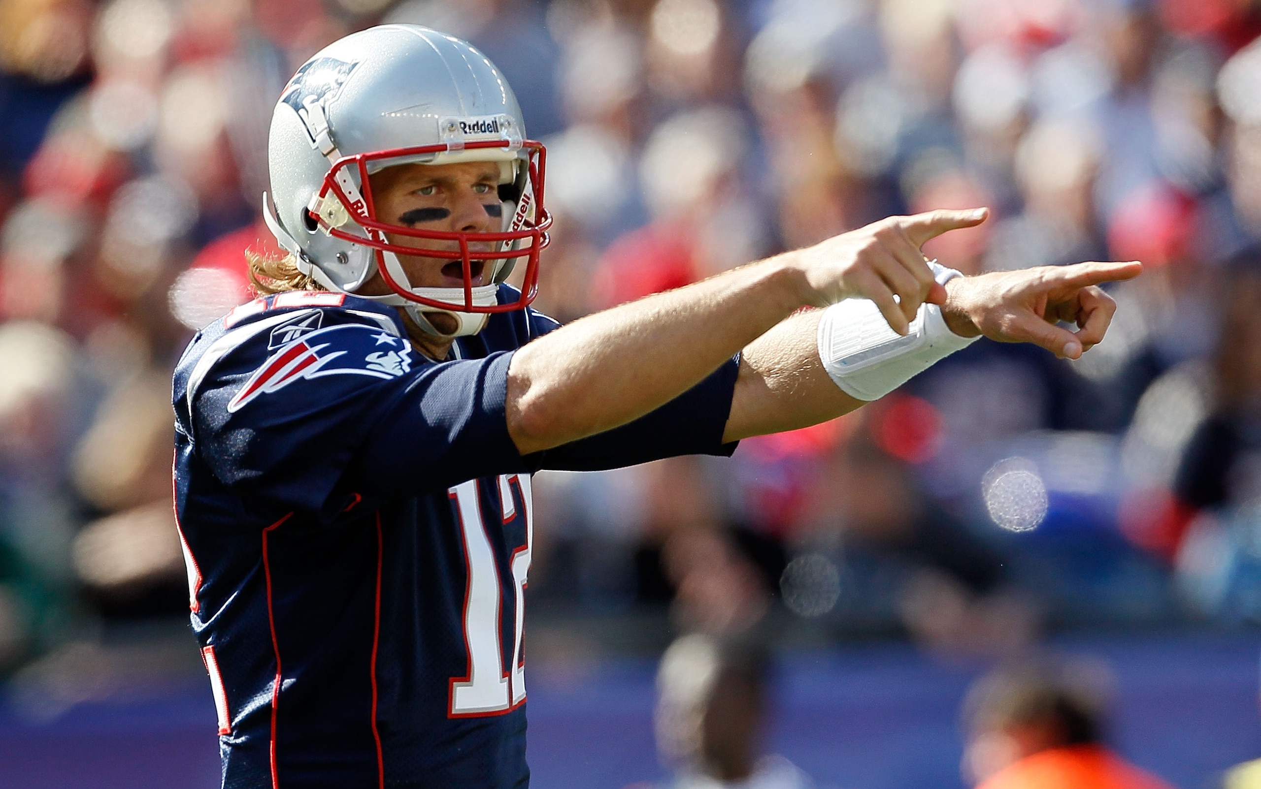 FOXBORO, MA - OCTOBER 17: Tom Brady #12 of the New England Patriots gestures during a game against the Baltimore Ravens at Gillette Stadium on October 17, 2010 in Foxboro, Massachusetts. (Photo by Jim Rogash/Getty Images) FOXBORO, MA - OCTOBER 17: Tom Brady #12 of the New England Patriots gestures during a game against the Baltimore Ravens at Gillette Stadium on October 17, 2010 in Foxboro, Massachusetts. (Photo by Jim Rogash/Getty Images)