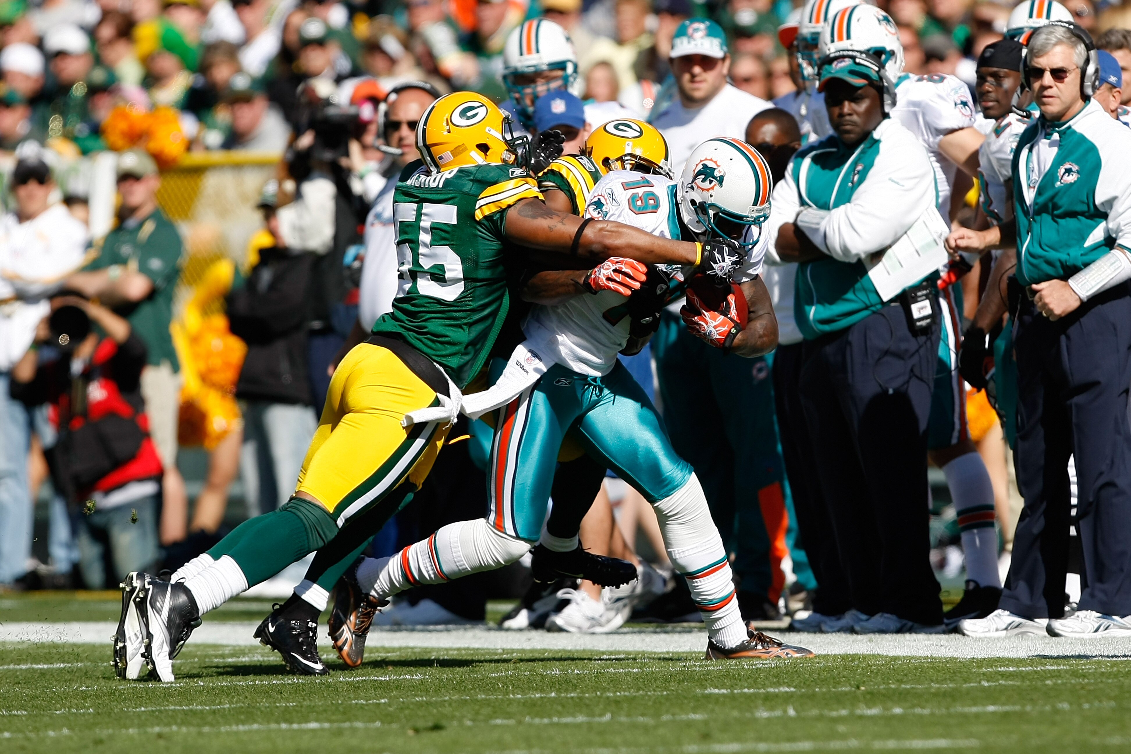 GREEN BAY, WI - OCTOBER 17: Brandon Marshall #19 of the Miami Dolphins runs against the Green Bay Packers at Lambeau Field on October 17, 2010 in Green Bay, Wisconsin. (Photo by Scott Boehm/Getty Images)