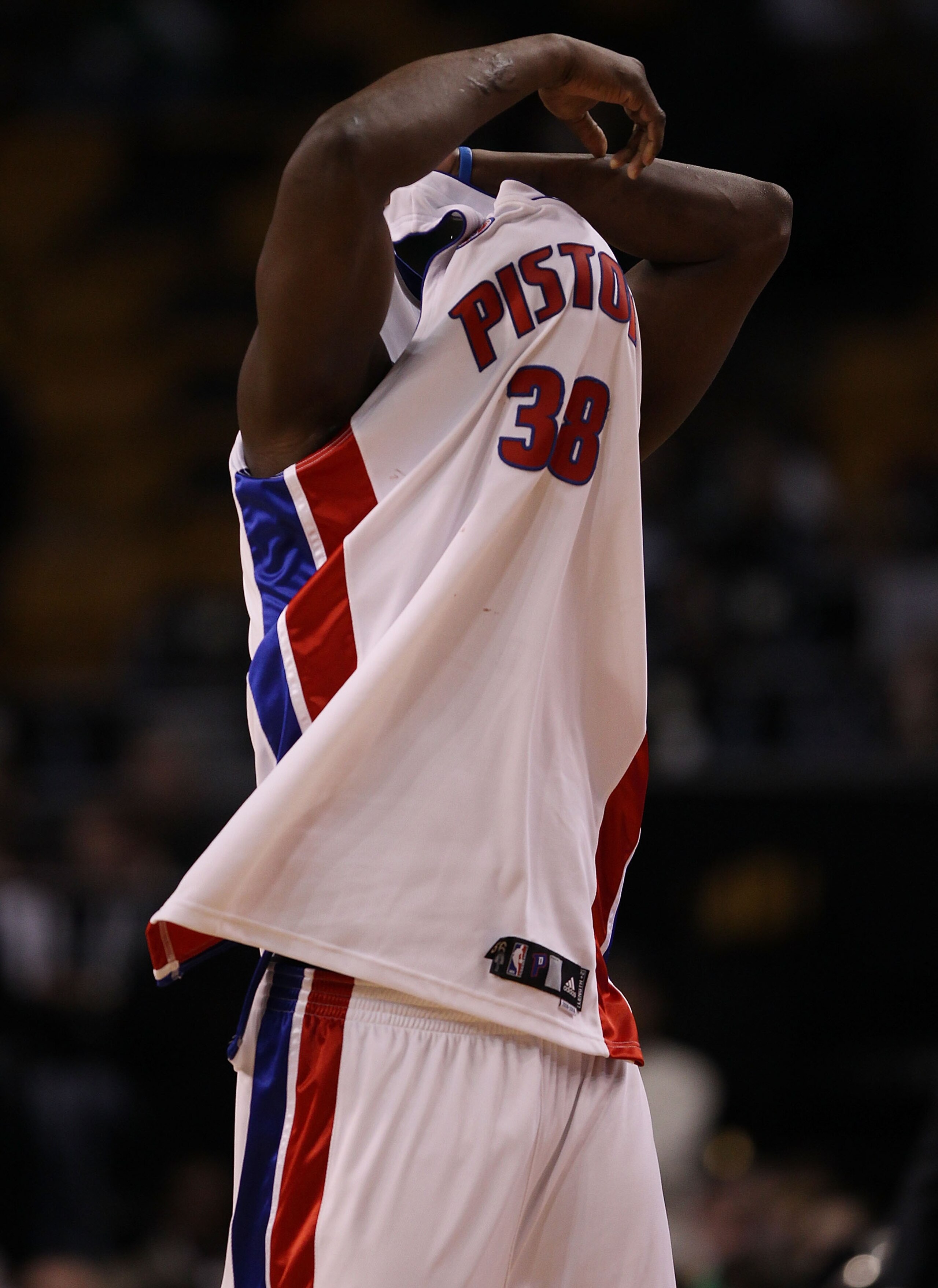 BOSTON - MARCH 15:  Kwame Brown #38 of the Detroit Pistons changes his jersey as instructed by a referee  in the second half against the Boston Celtics on March 15, 2010 at the TD Garden in Boston, Massachusetts. The Celtics defeated the Pistons 119-93.  
