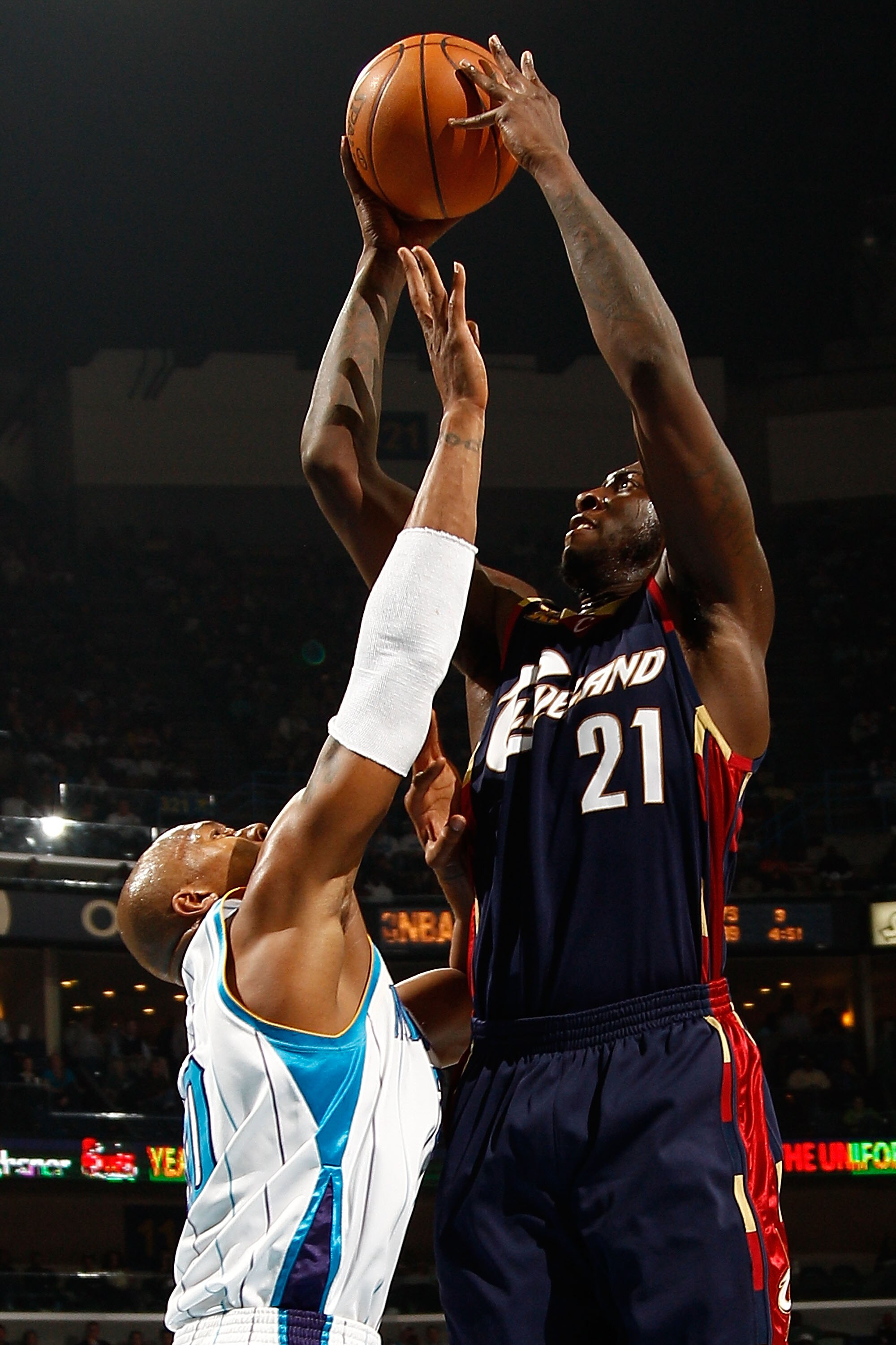 NEW ORLEANS - MARCH 24:  J.J. Hickson #21 of the Cleveland Cavaliers shoots the ball over David West #30 of the New Orleans Hornets at the New Orleans Arena on March 24, 2010 in New Orleans, Louisiana.  The Cavaliers defeated the Hornets 105-92.  NOTE TO 