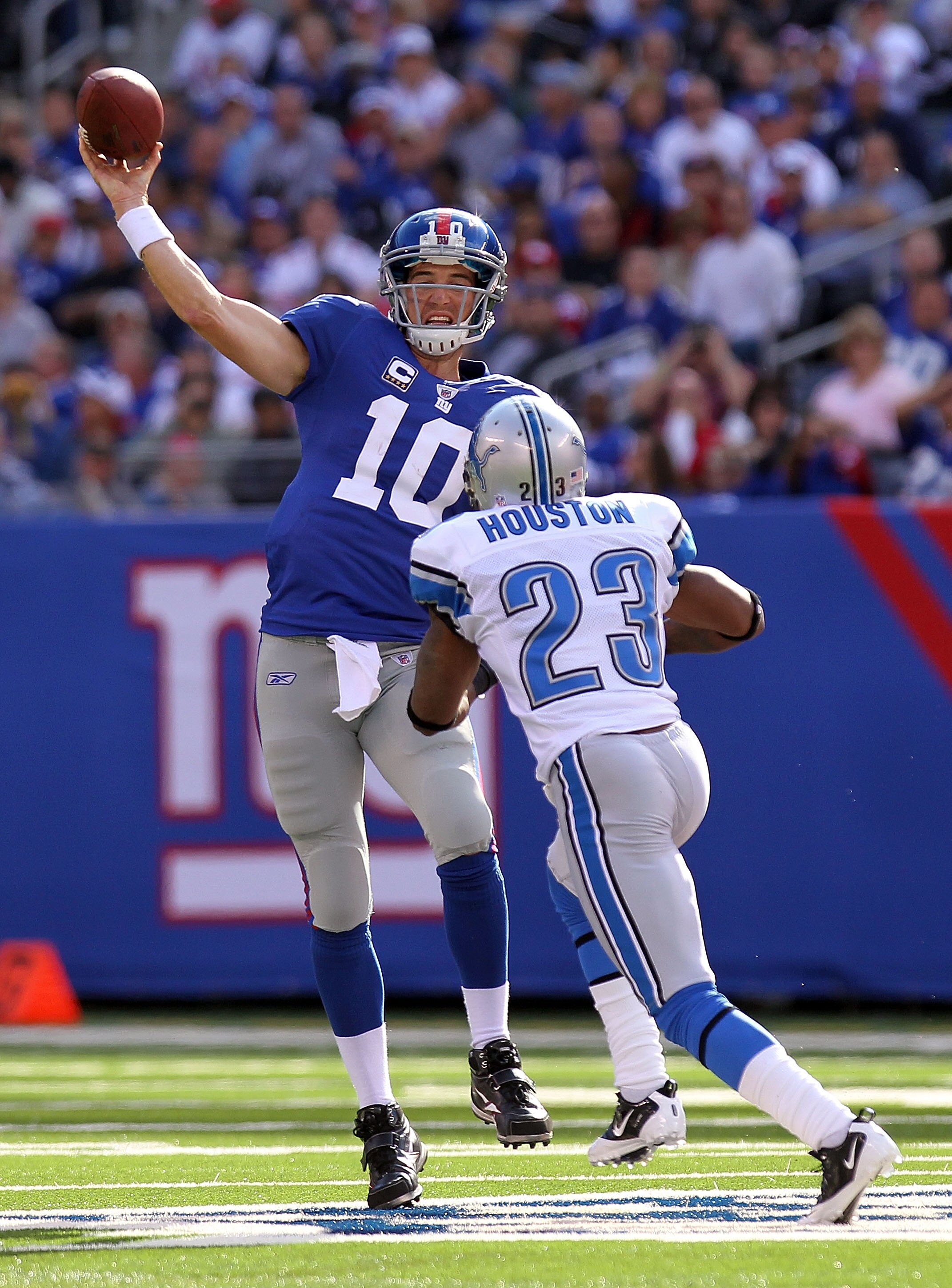 EAST RUTHERFORD, NJ - OCTOBER 17:  Eli Manning #10 of the New York Giants passes against the Detroit Lions at New Meadowlands Stadium on October 17, 2010 in East Rutherford, New Jersey.  (Photo by Nick Laham/Getty Images)