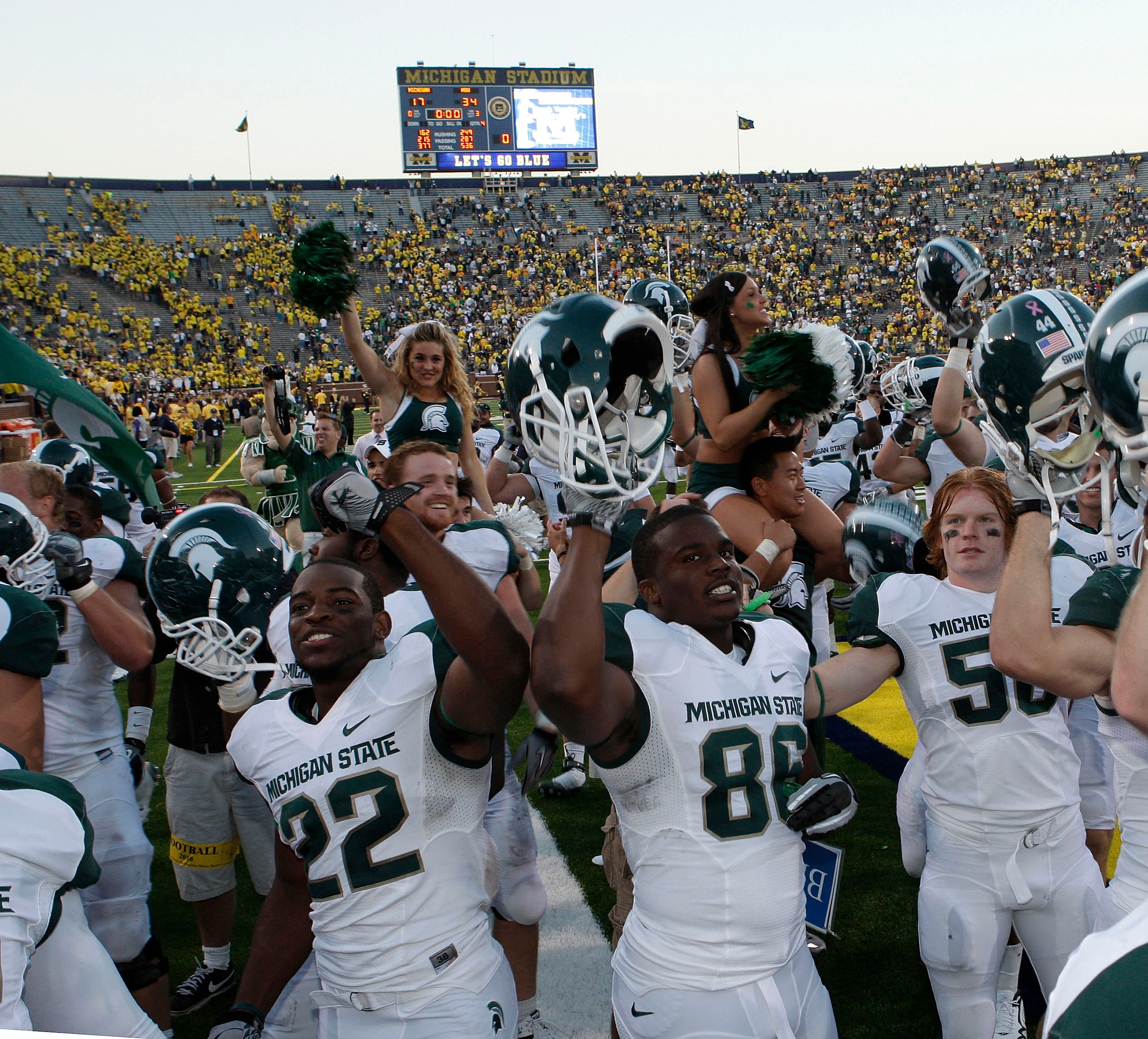 ANN ARBOR, MI - OCTOBER 09: Josh Bodell #22 and Fred Smith #86 of the Michigan State Spartans celebrate their win over the Michigan Wolverines 34-17 on October 9, 2010 at Michigan Stadium in Ann Arbor, Michigan. (Photo by Leon Halip/Getty Images)