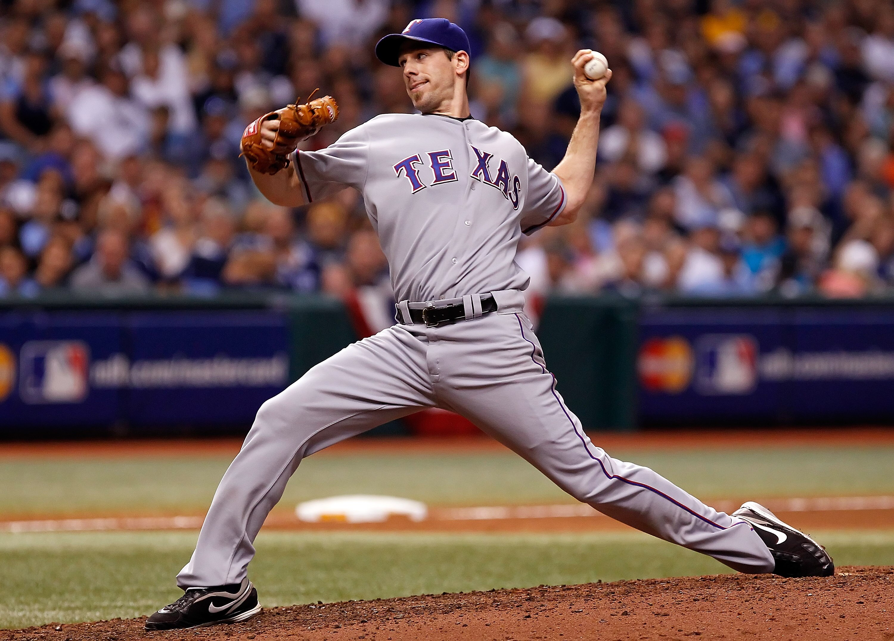 ST. PETERSBURG, FL - OCTOBER 12:  Pitcher Cliff Lee #33 of the Texas Rangers pitches against the Tampa Bay Rays during Game 5 of the ALDS at Tropicana Field on October 12, 2010 in St. Petersburg, Florida.  (Photo by J. Meric/Getty Images)