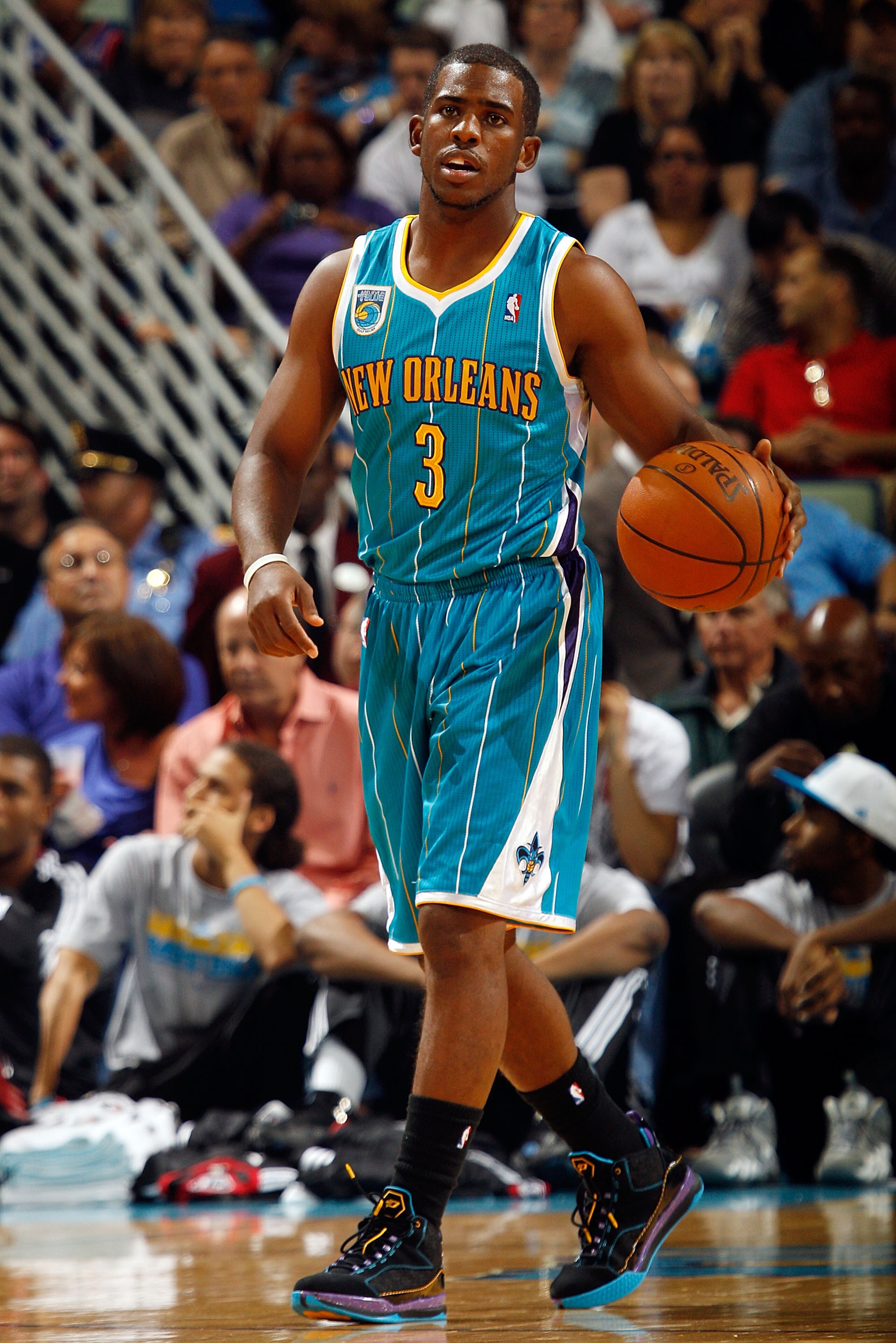 NEW ORLEANS - OCTOBER 13:  Chris Paul #3 of the New Orleans Hornets drives the ball up the court during the game against the Miami Heat at the New Orleans Arena on October 13, 2010 in New Orleans, Louisiana. NOTE TO USER: User expressly acknowledges and a