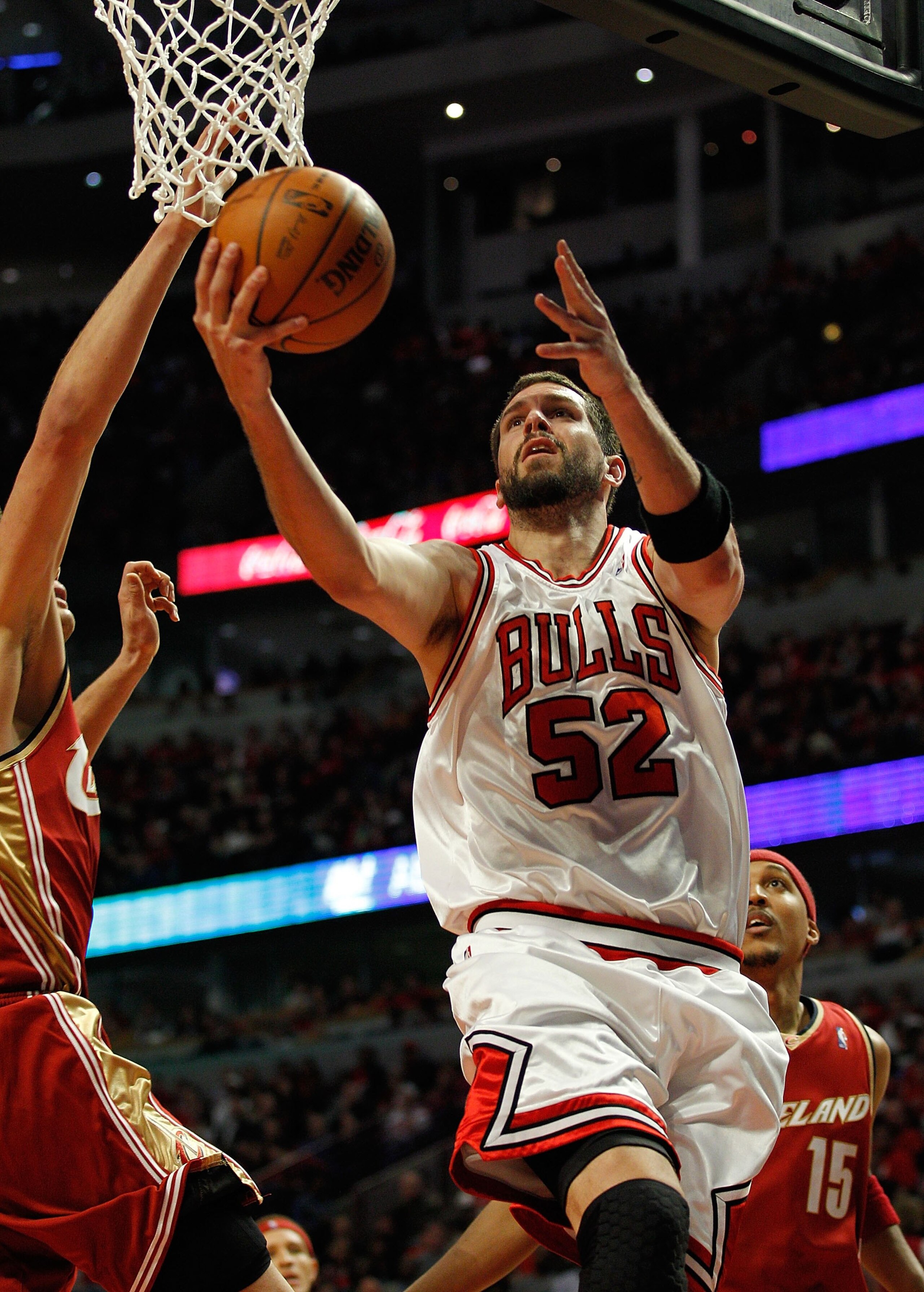 CHICAGO - APRIL 25: Brad Miller #52 of the Chicago Bulls puts up a shot against the Cleveland Cavaliers in Game Four of the Eastern Conference Quarterfinals during the 2010 NBA Playoffs at the United Center on April 25, 2010 in Chicago, Illinois. The Cava