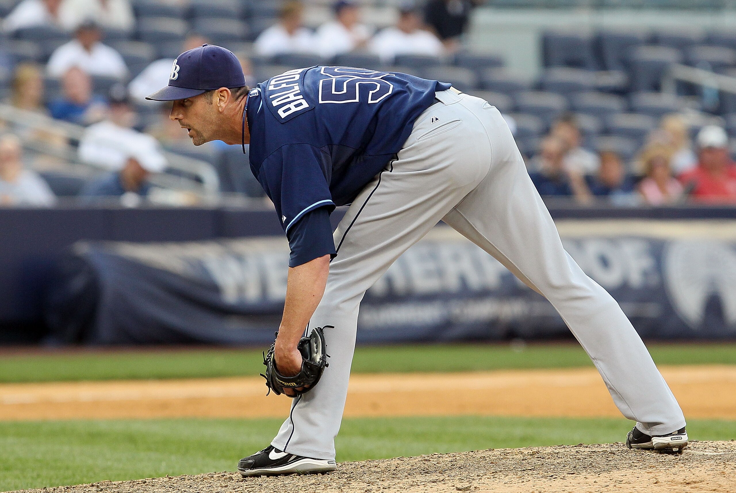 NEW YORK - JULY 17: Grant Balfour #50 of the Tampa Bay Rays delivers a pitch against the New York Yankees on July 17, 2010 at Yankee Stadium in the Bronx borough of New York City. The Rays defeated the Yankees 10-5. (Photo by Jim McIsaac/Getty Images) NEW YORK - JULY 17: Grant Balfour #50 of the Tampa Bay Rays delivers a pitch against the New York Yankees on July 17, 2010 at Yankee Stadium in the Bronx borough of New York City. The Rays defeated the Yankees 10-5. (Photo by Jim McIsaac/Getty Images)
