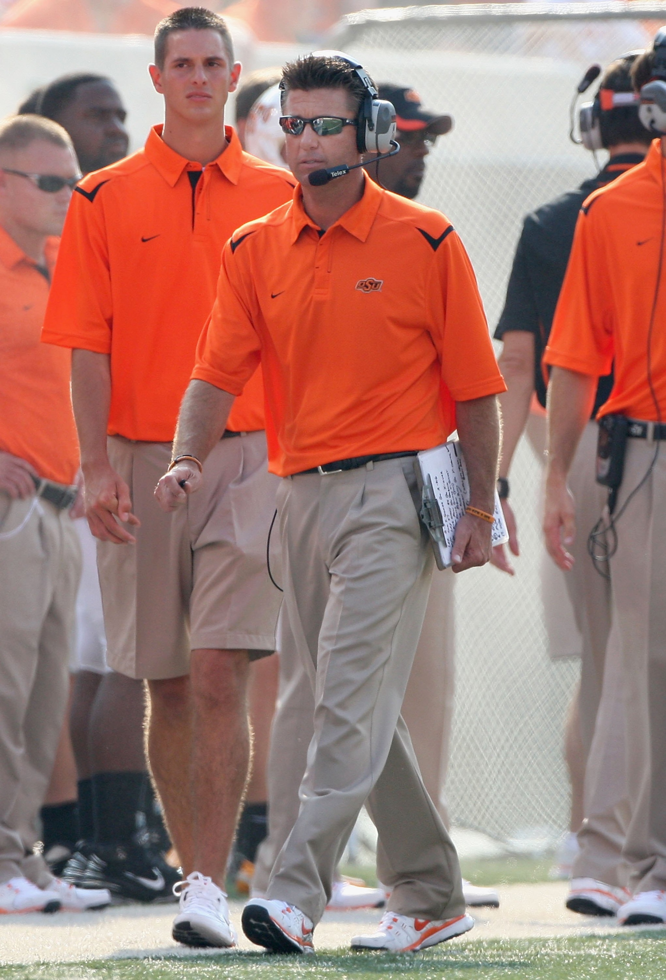 STILLWATER, OK - SEPTEMBER 05:  Head coach Mike Gundy of the Oklahoma State Cowboys walks the sidelines during the college football game against the Georgia Bulldogs at Boone Pickens Stadium on September 5, 2009 in Stillwater, Oklahoma.  The Cowboys defea