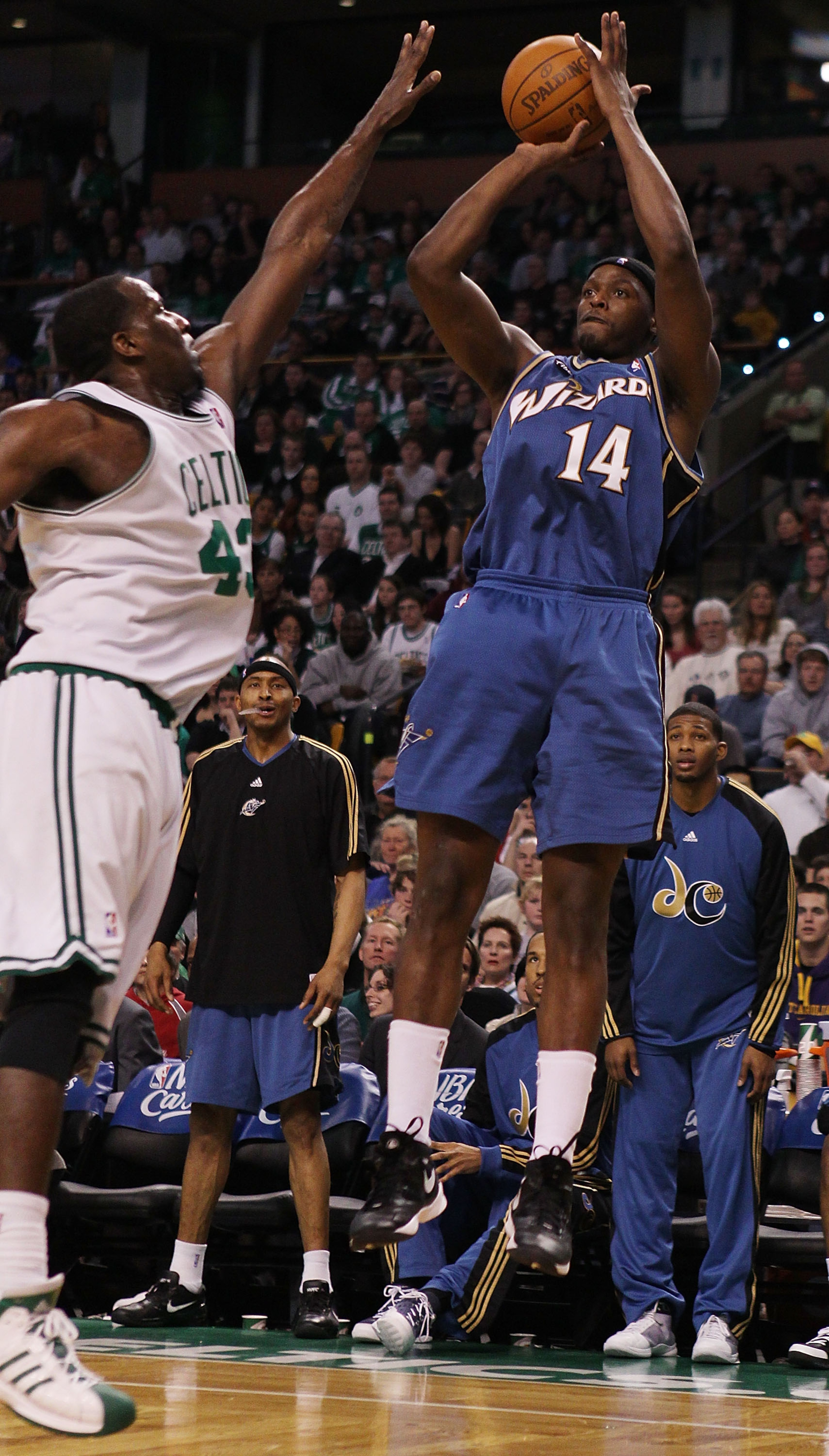 BOSTON - MARCH 07:  Al Thornton #14 of the Washington Wizards taks a shot as Kendrick Perkins #43 of the Boston Celtics defends on March 7, 2010 at the TD Garden in Boston, Massachusetts.  NOTE TO USER: User expressly acknowledges and agrees that, by down