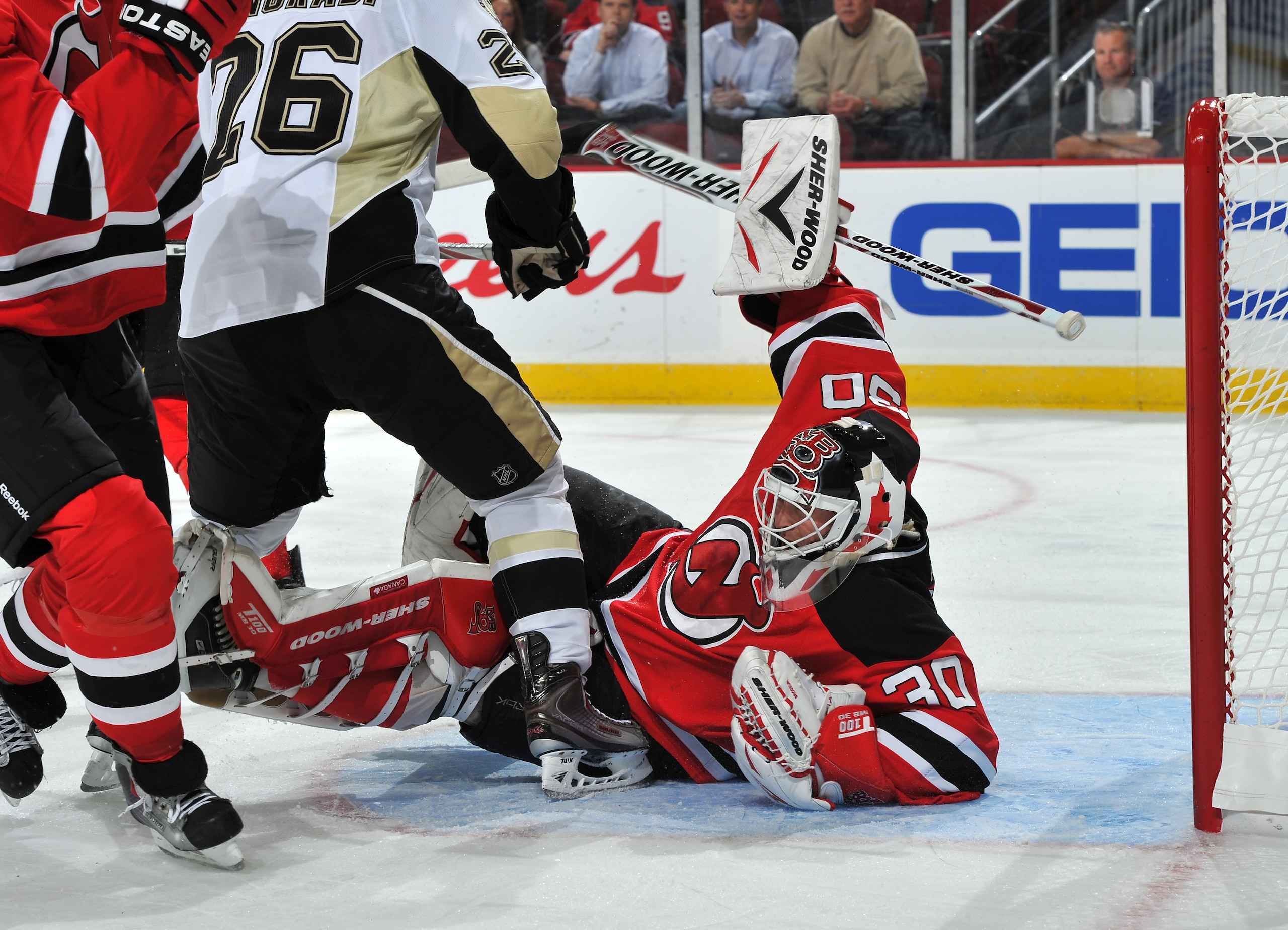NEWARK, NJ - OCTOBER 11: Martin Brodeur #30 of the New Jersey Devils tends goal in the first period against the Pittsburgh Penguins at the Prudential Center on October 11, 2010 in Newark, New Jersey. The Penguins defeated the Devils 3-1. (Photo by Christo