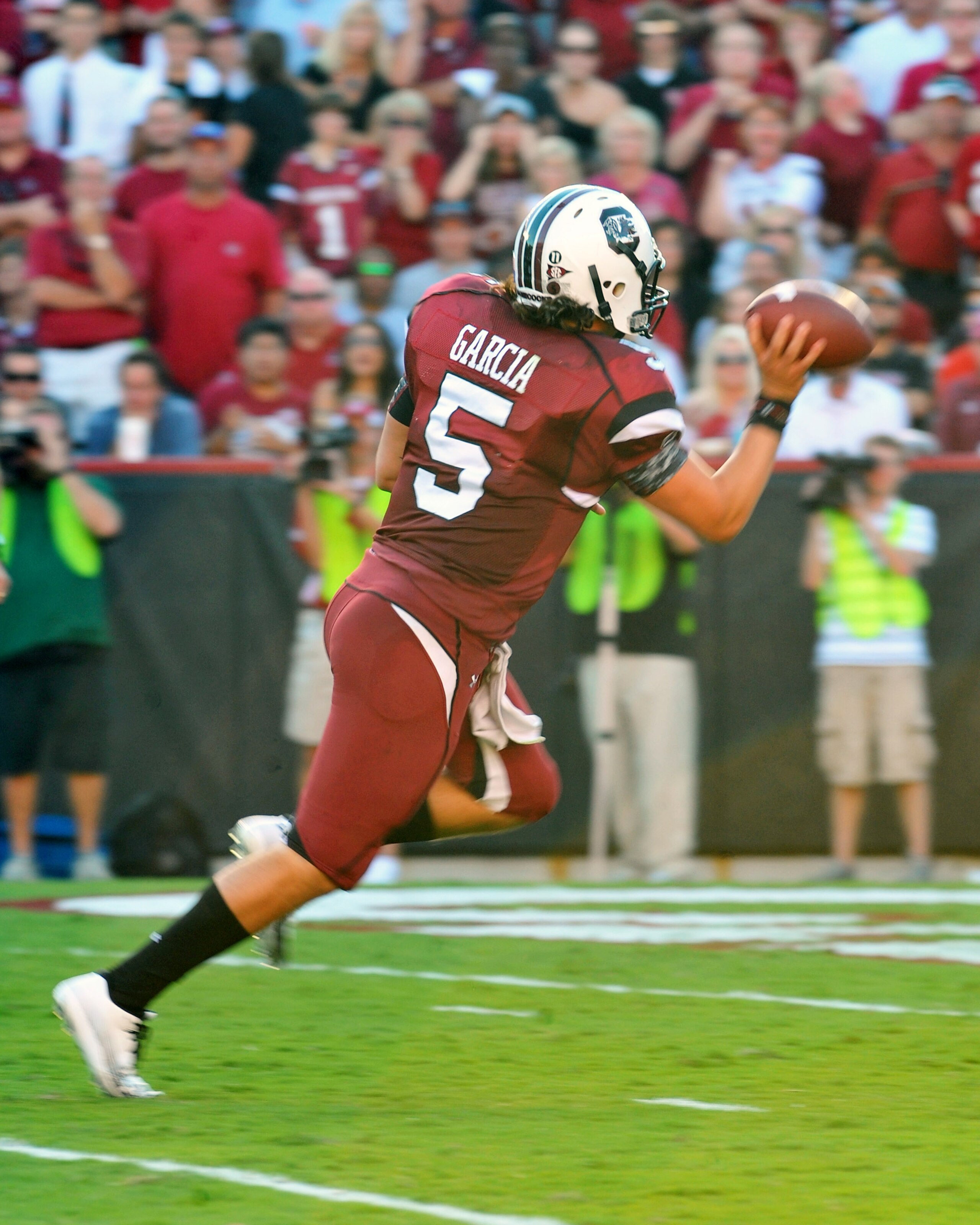 COLUMBIA, SC - OCTOBER 9: Quarterback Stephen Garcia #5 of the South Carolina Gamecocks tosses the football out of the end zone to avoid a sack after a botched snap against the Alabama Crimson Tide October 9, 2010 at Williams-Brice Stadium in Columbia, So