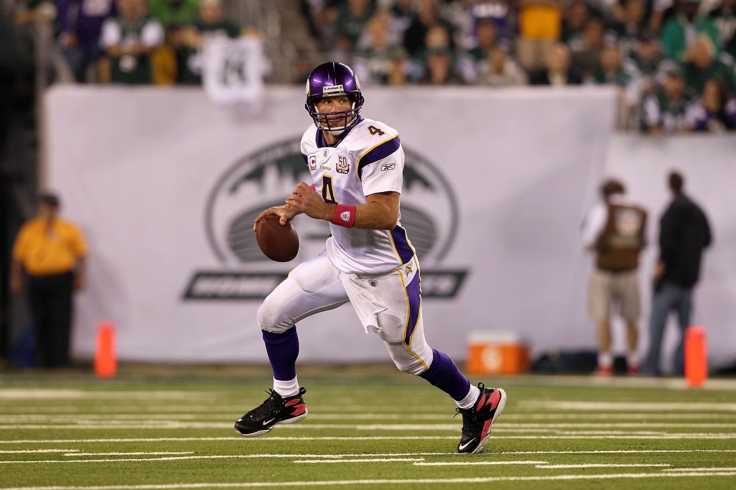 EAST RUTHERFORD, NJ - OCTOBER 11:  Quarterback Brett Favre #4 of the Minnesota Vikings looks to pass in the first half against the New York Jets at New Meadowlands Stadium on October 11, 2010 in East Rutherford, New Jersey.  (Photo by Jim McIsaac/Getty Im