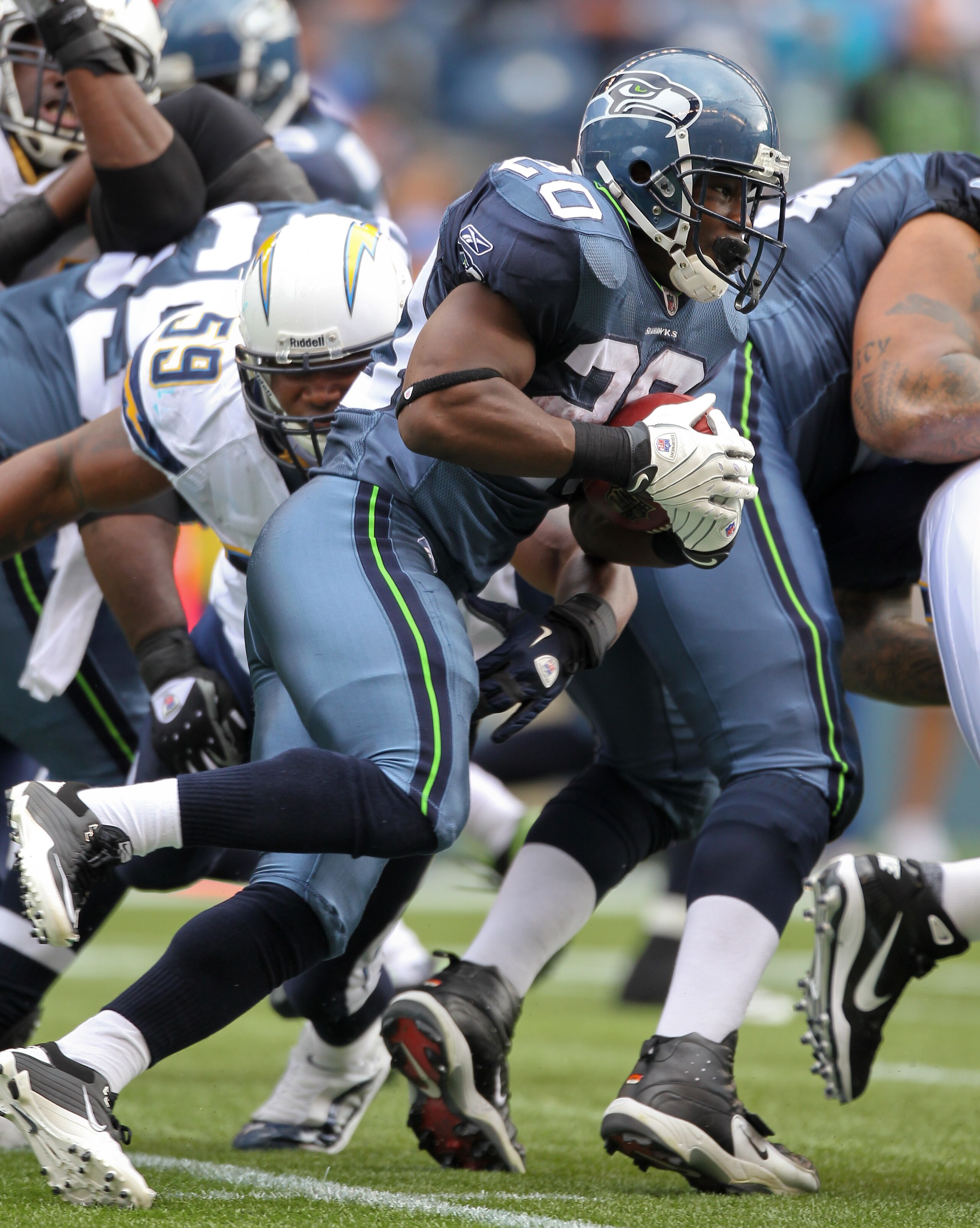 SEATTLE - SEPTEMBER 26:  Running back Justin Forsett #20 of the Seattle Seahawks rushes against the San Diego Chargers at Qwest Field on September 26, 2010 in Seattle, Washington. (Photo by Otto Greule Jr/Getty Images)