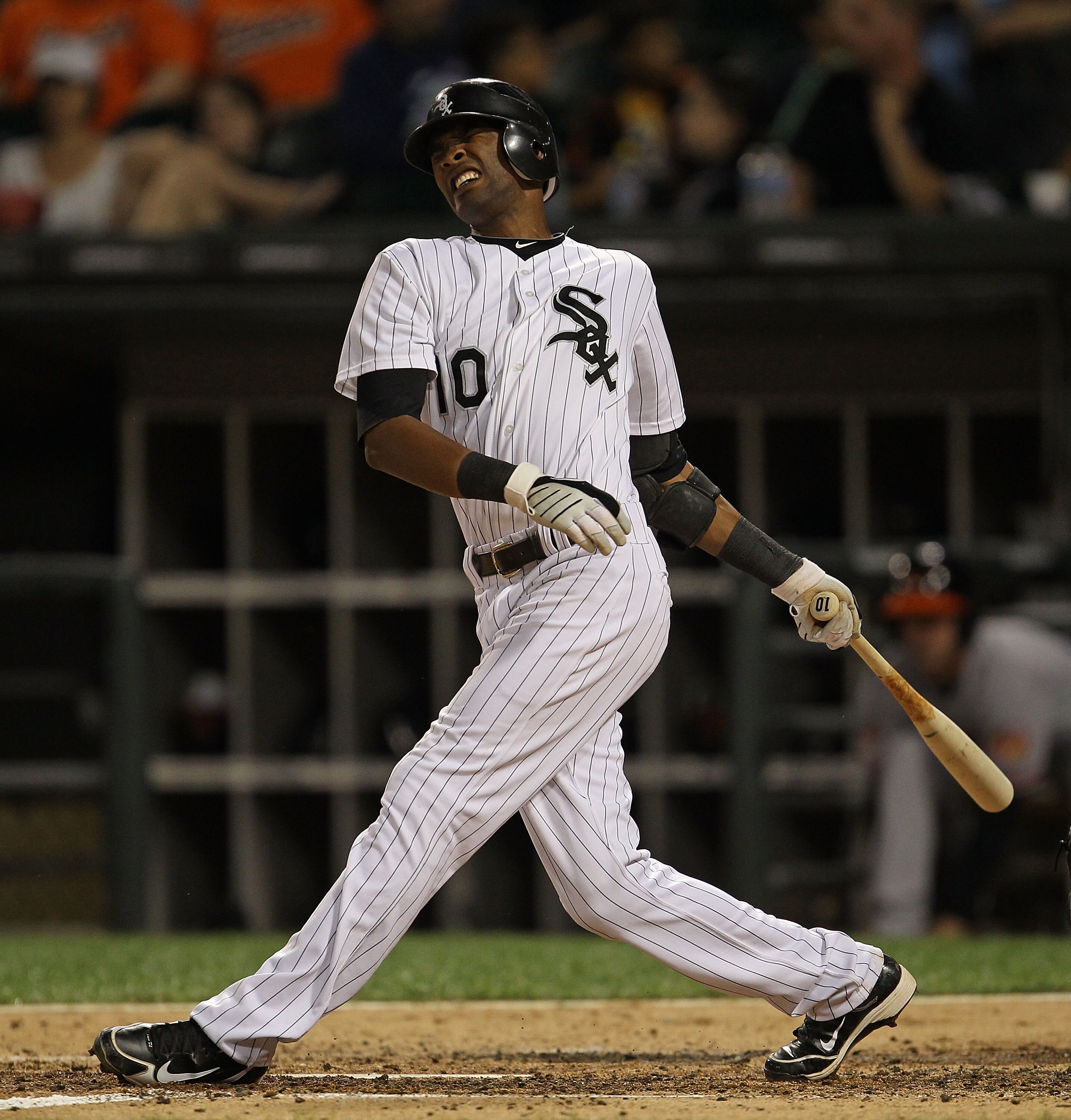 CHICAGO - AUGUST 25: Alexei Ramirez #10 of the Chicago White Sox winces after fouling a ball off of his foot during a game against the Baltimore Orioles at U.S. Cellular Field on August 25, 2010 in Chicago, Illinois. The Orioles defeated the White Sox 4-2
