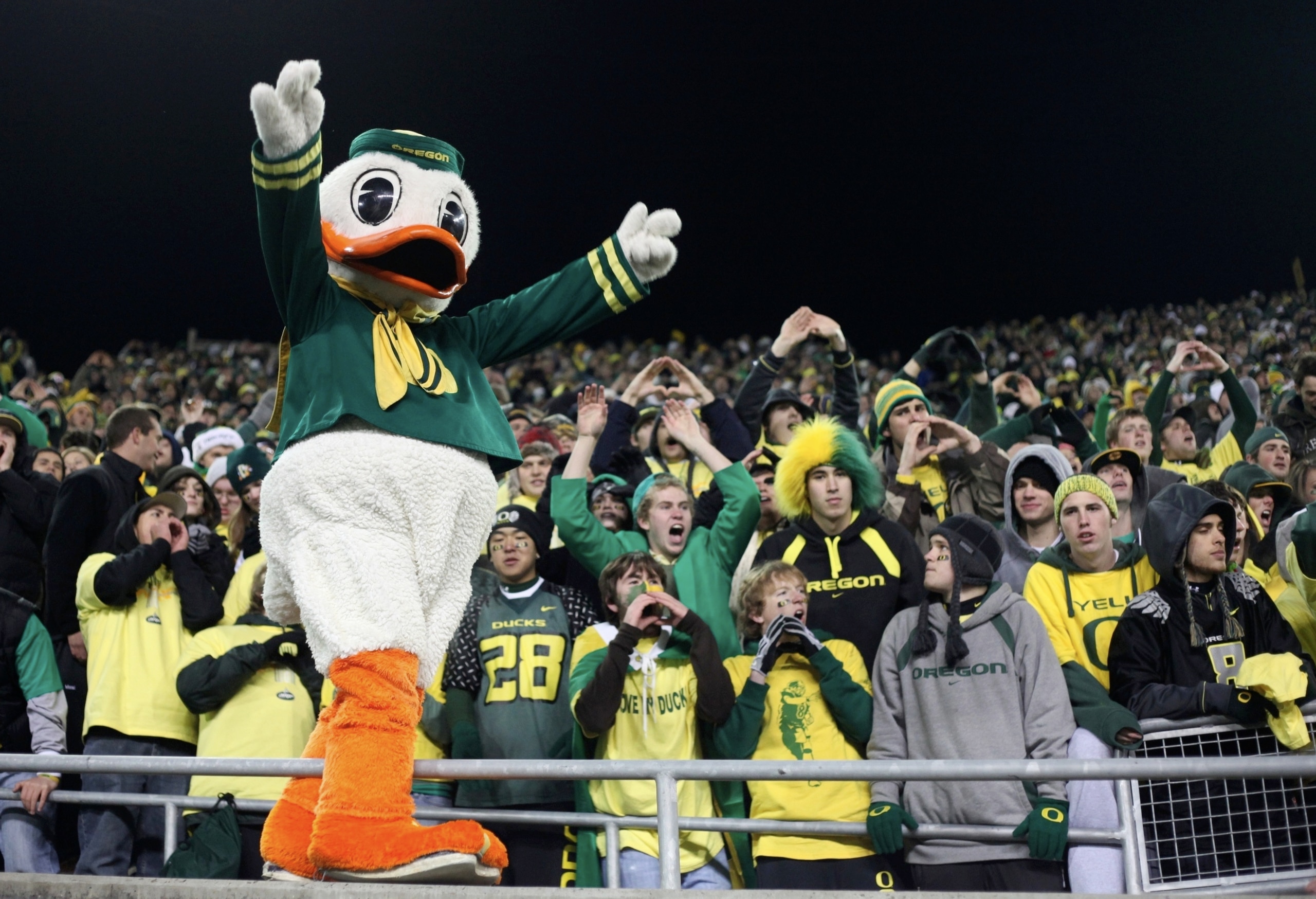 EUGENE,OR - DECEMBER 03:  Oregon Ducks mascot Puddles cheers after his team's 33-37 victory over the Oregon State Beavers after the game at Autzen Stadium on December 3, 2009 in Eugene, Oregon.  (Photo by Tom Hauck/Getty Images)