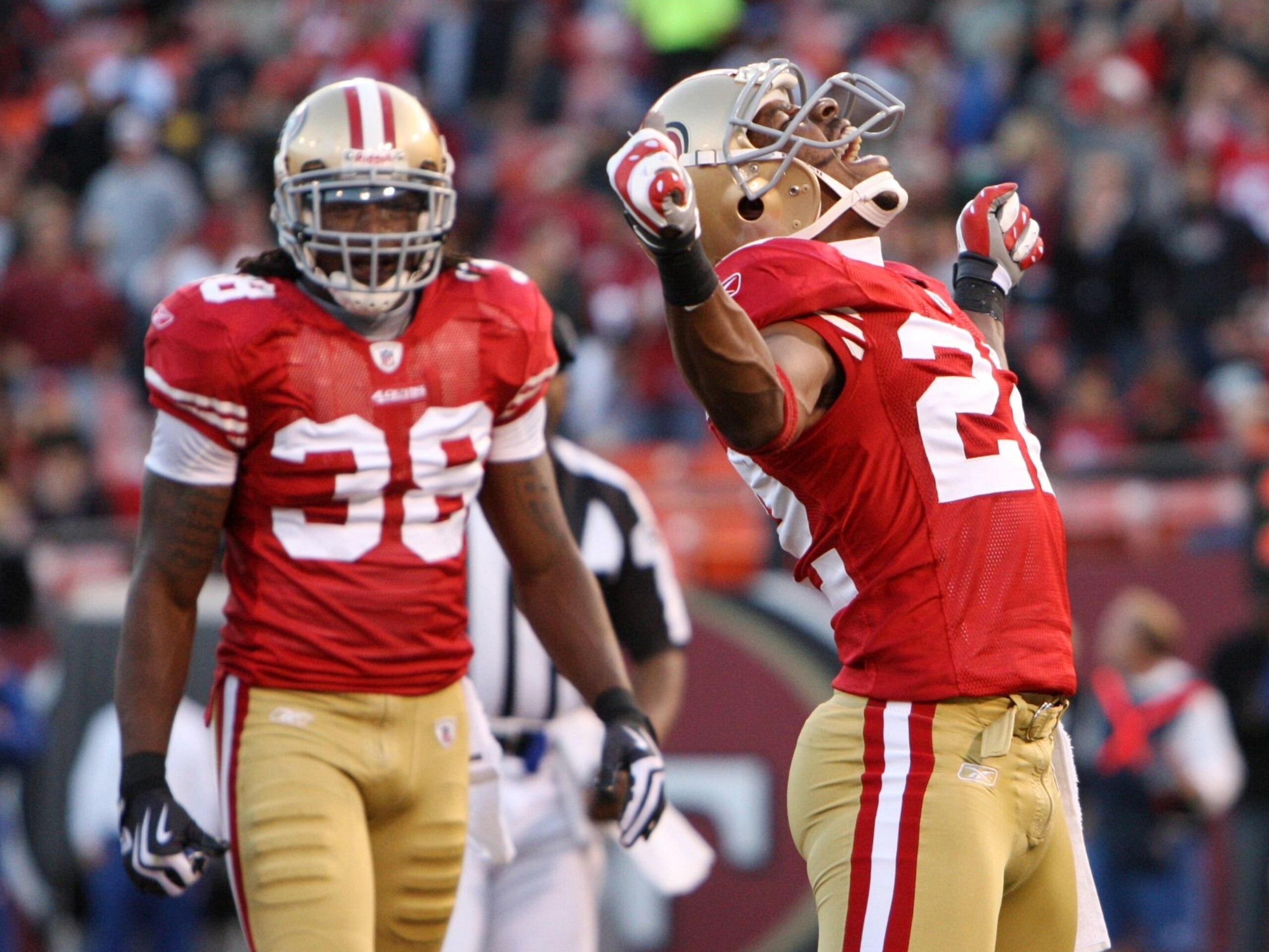 SAN FRANCISCO - AUGUST 14:  Nate Clements #22 of the San Francisco 49ers celebrates getting an interception against the Denver Broncos during the preseason game on August 14, 2009 at Candlestick Park in San Francisco, California. (Photo by Jed Jacobsohn/G