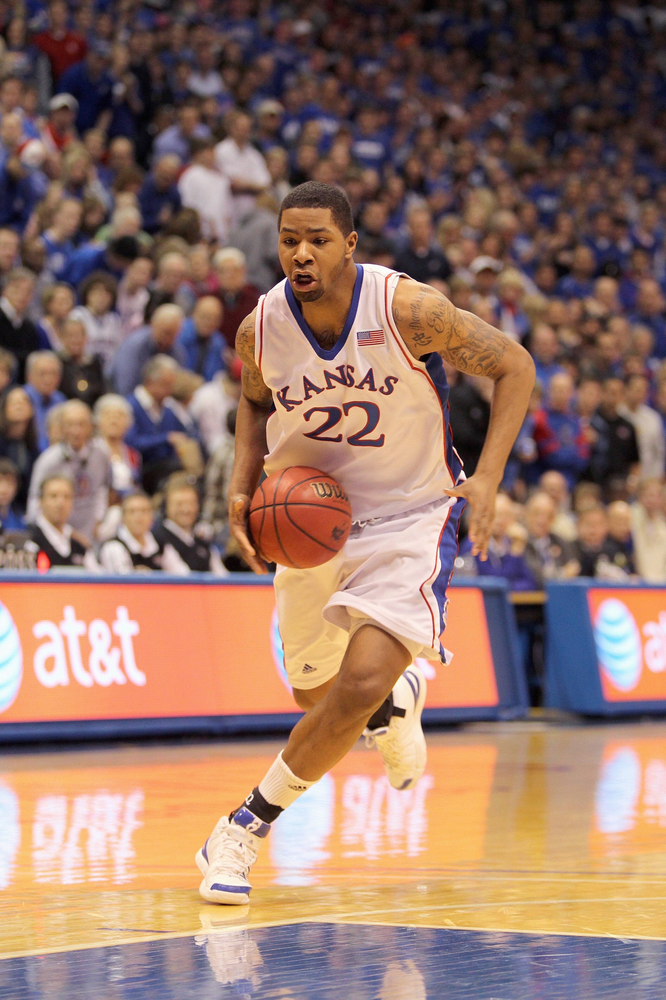 LAWRENCE, KS - FEBRUARY 06: Marcus Morris #22 of the Kansas Jayhawks drives the ball downcourt during the game against the Nebraska Cornhuskers on February 6, 2010 at Allen Fieldhouse in Lawrence, Kansas. (Photo by Jamie Squire/Getty Images)