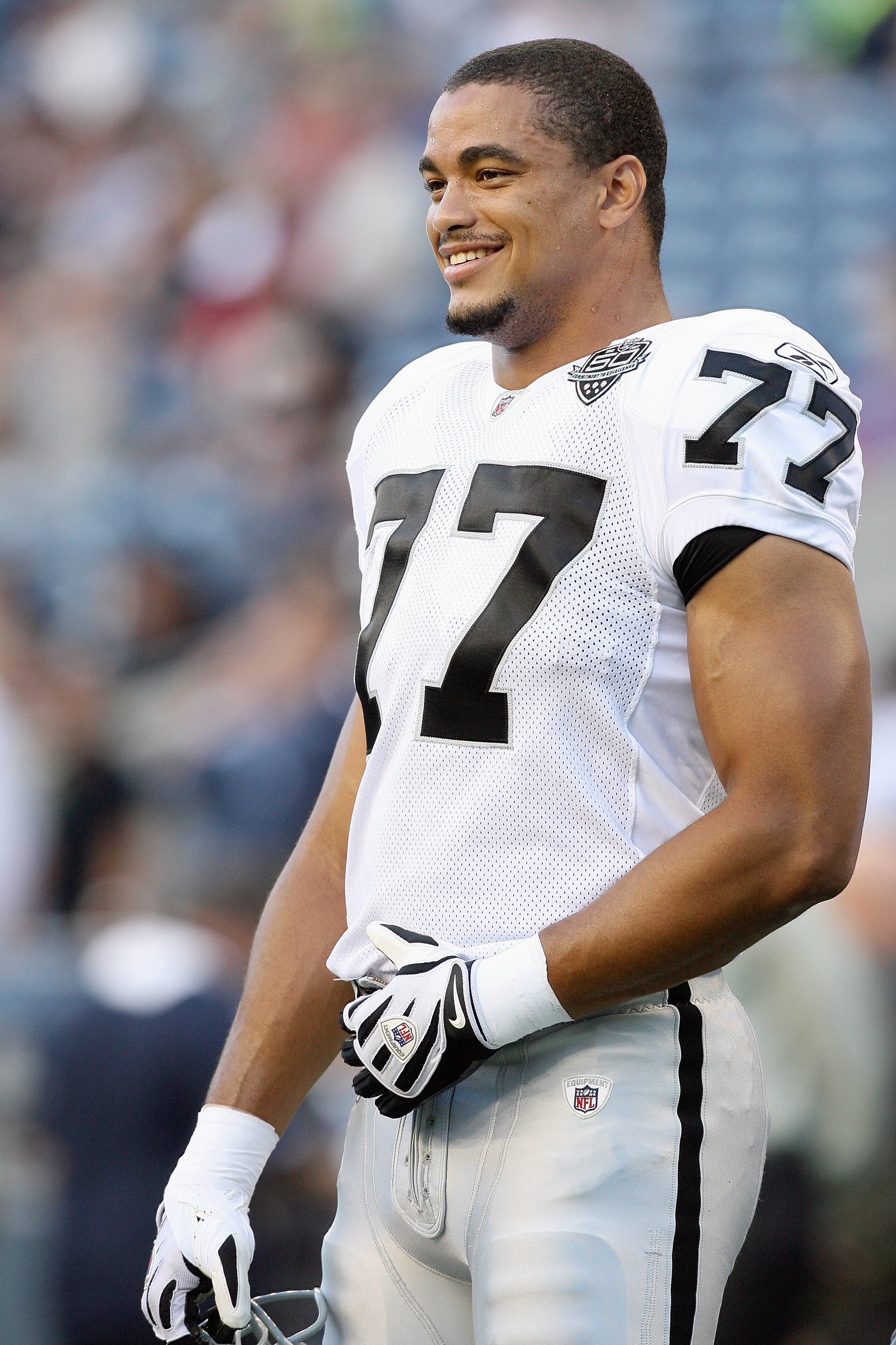 SEATTLE - SEPTEMBER 03:  Matt Shaughnessy #77 of the Oakland Raiders stands on the field before the game against the Seattle Seahawks on September 3, 2009 at Qwest Field in Seattle, Washington. (Photo by Otto Greule Jr/Getty Images)