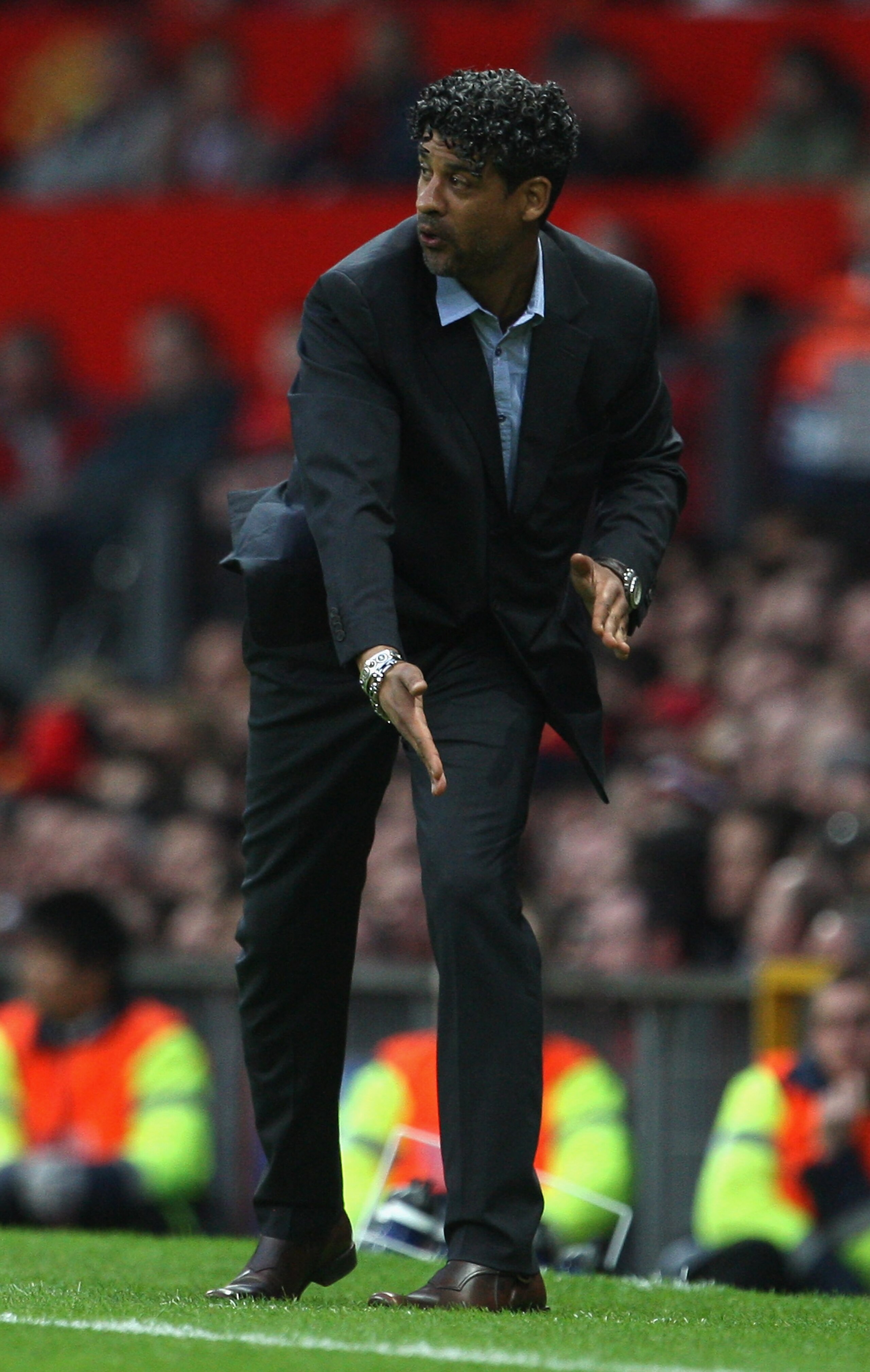 MANCHESTER, UNITED KINGDOM - APRIL 29:  Barcelona Manager Frank Rijkaard gestures during the UEFA Champions League Semi Final, second leg match between Manchester United and Barcelona at Old Trafford on April 29, 2008 in Manchester, England.  (Photo by La