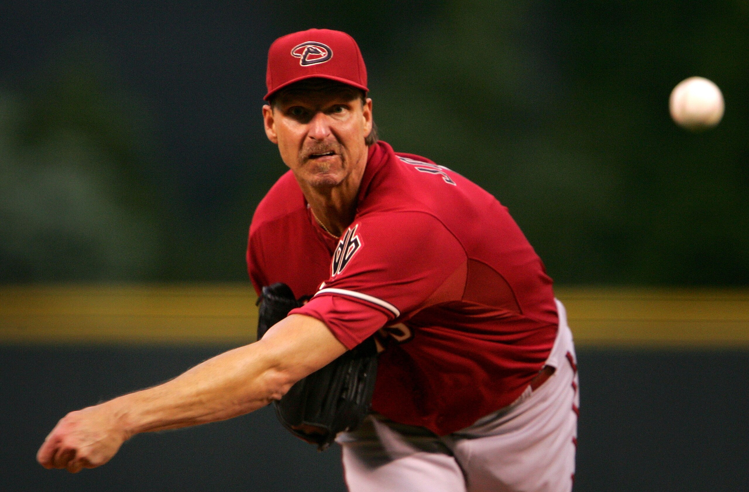 DENVER - MAY 15: Starting pitcher Randy Johnson #51 of the Arizona Diamondbacks delivers against the Colorado Rockies on May 15, 2007 at Coors Field in Denver, Colorado. (Photo by Doug Pensinger/Getty Images) DENVER - MAY 15: Starting pitcher Randy Johnson #51 of the Arizona Diamondbacks delivers against the Colorado Rockies on May 15, 2007 at Coors Field in Denver, Colorado. (Photo by Doug Pensinger/Getty Images)