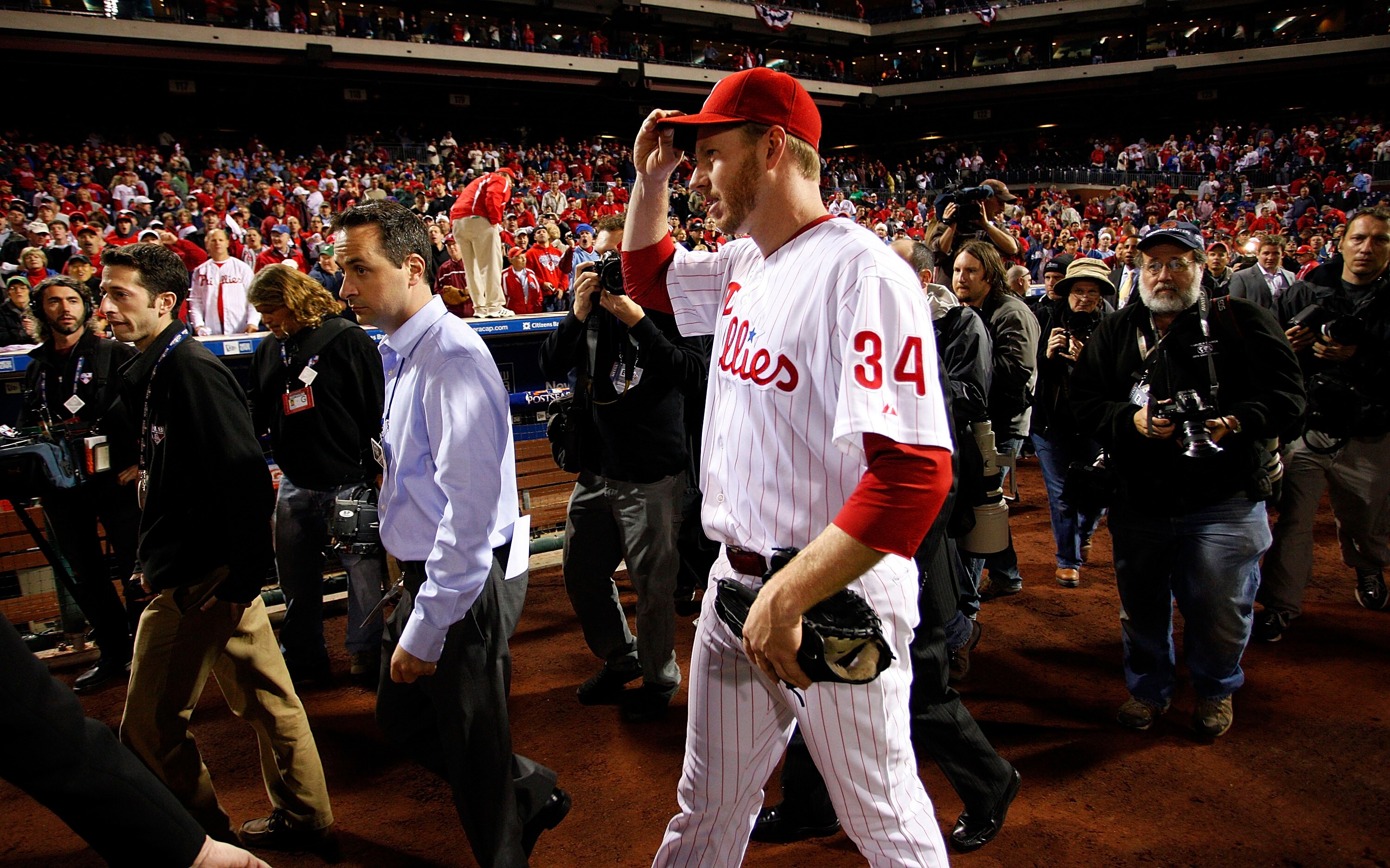 PHILADELPHIA - OCTOBER 06:  Roy Halladay #34 of the Philadelphia Phillies walks to the dugout after pitching a no-hitter in Game 1 of the NLDS against the Cincinnati Reds at Citizens Bank Park on October 6, 2010 in Philadelphia, Pennsylvania.  (Photo by J