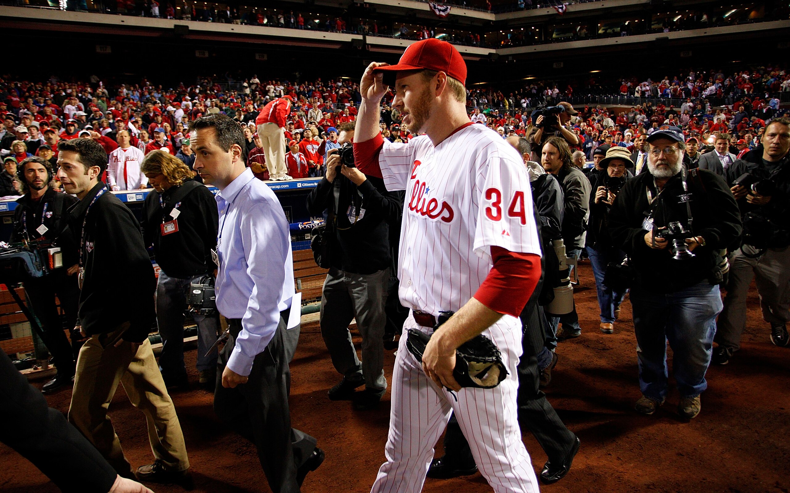 PHILADELPHIA - OCTOBER 06: Roy Halladay #34 of the Philadelphia Phillies walks to the dugout after pitching a no-hitter in Game 1 of the NLDS against the Cincinnati Reds at Citizens Bank Park on October 6, 2010 in Philadelphia, Pennsylvania. (Photo by J PHILADELPHIA - OCTOBER 06: Roy Halladay #34 of the Philadelphia Phillies walks to the dugout after pitching a no-hitter in Game 1 of the NLDS against the Cincinnati Reds at Citizens Bank Park on October 6, 2010 in Philadelphia, Pennsylvania. (Photo by J