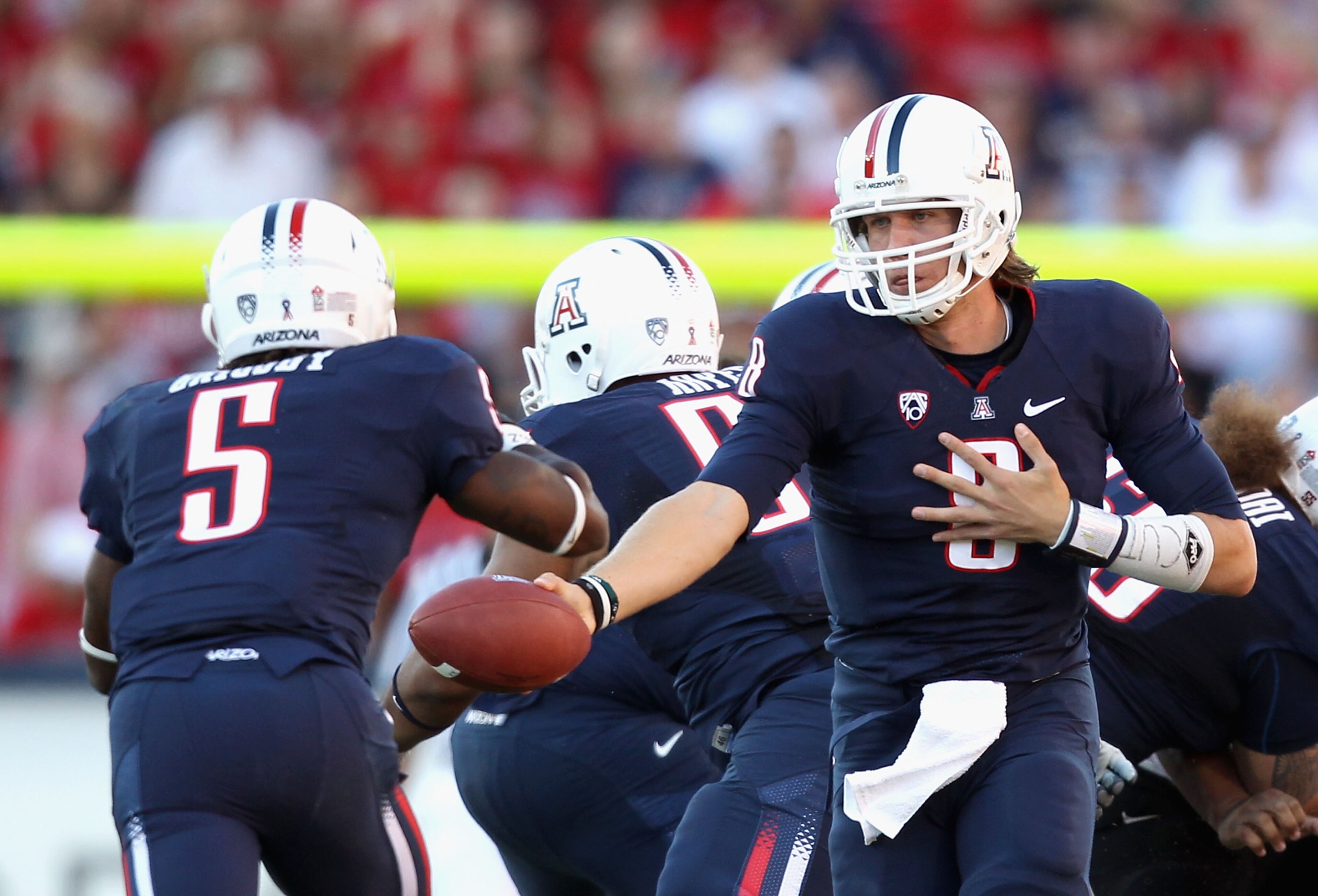 TUCSON, AZ - OCTOBER 09:  Quarterback Nick Foles #8 of the Arizona Wildcats  during the college football game against the Oregon State Beavers at Arizona Stadium on October 9, 2010 in Tucson, Arizona.  The Beavers defeated the Wildcats 29-27.  (Photo by C