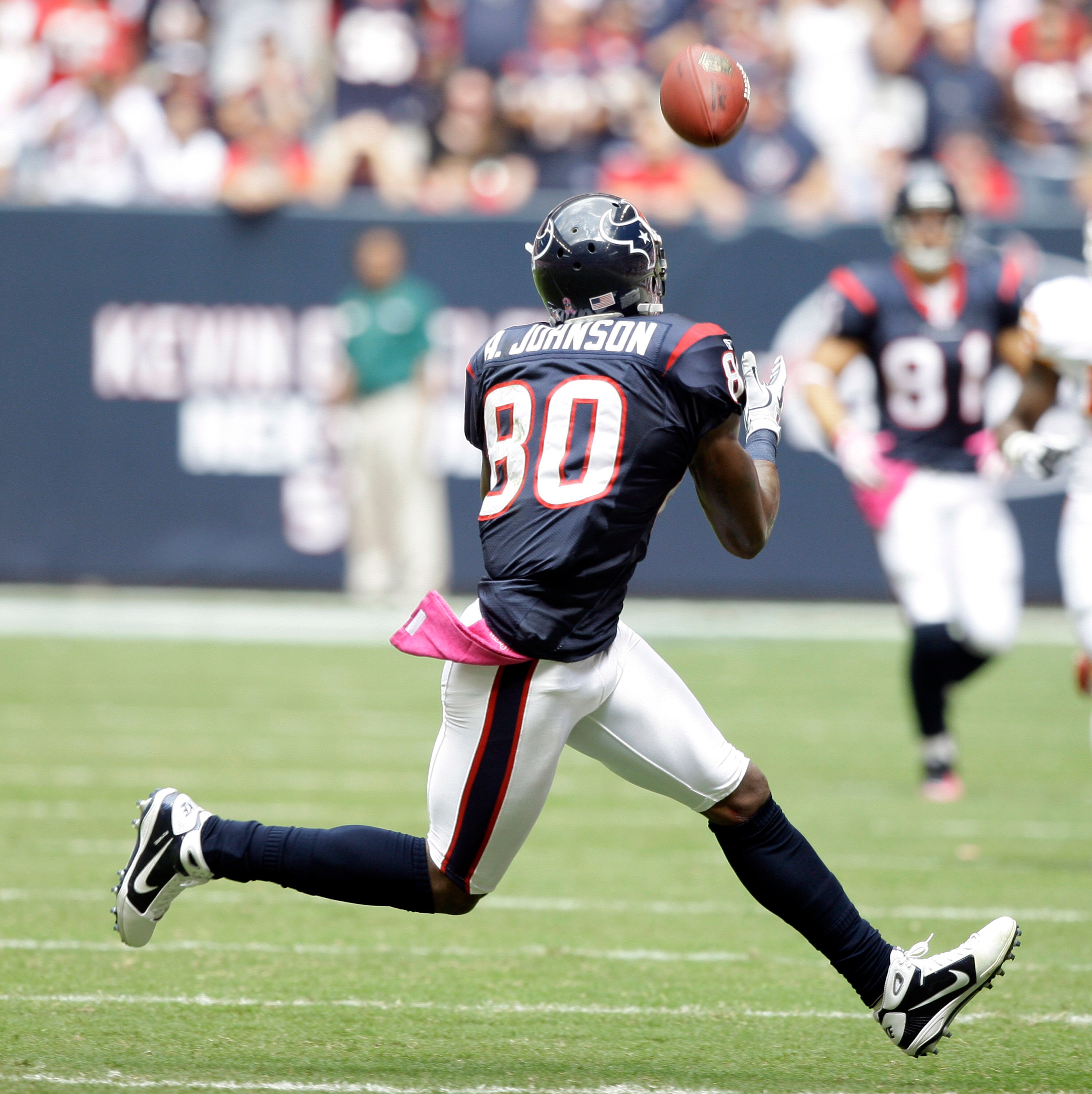 HOUSTON - OCTOBER 17:  Andre Johnson #80 of the Houston Texans completes a pass during game action against the Kansas City Chiefs at Reliant Stadium on October 17, 2010 in Houston, Texas.  (Photo by Bob Levey/Getty Images)