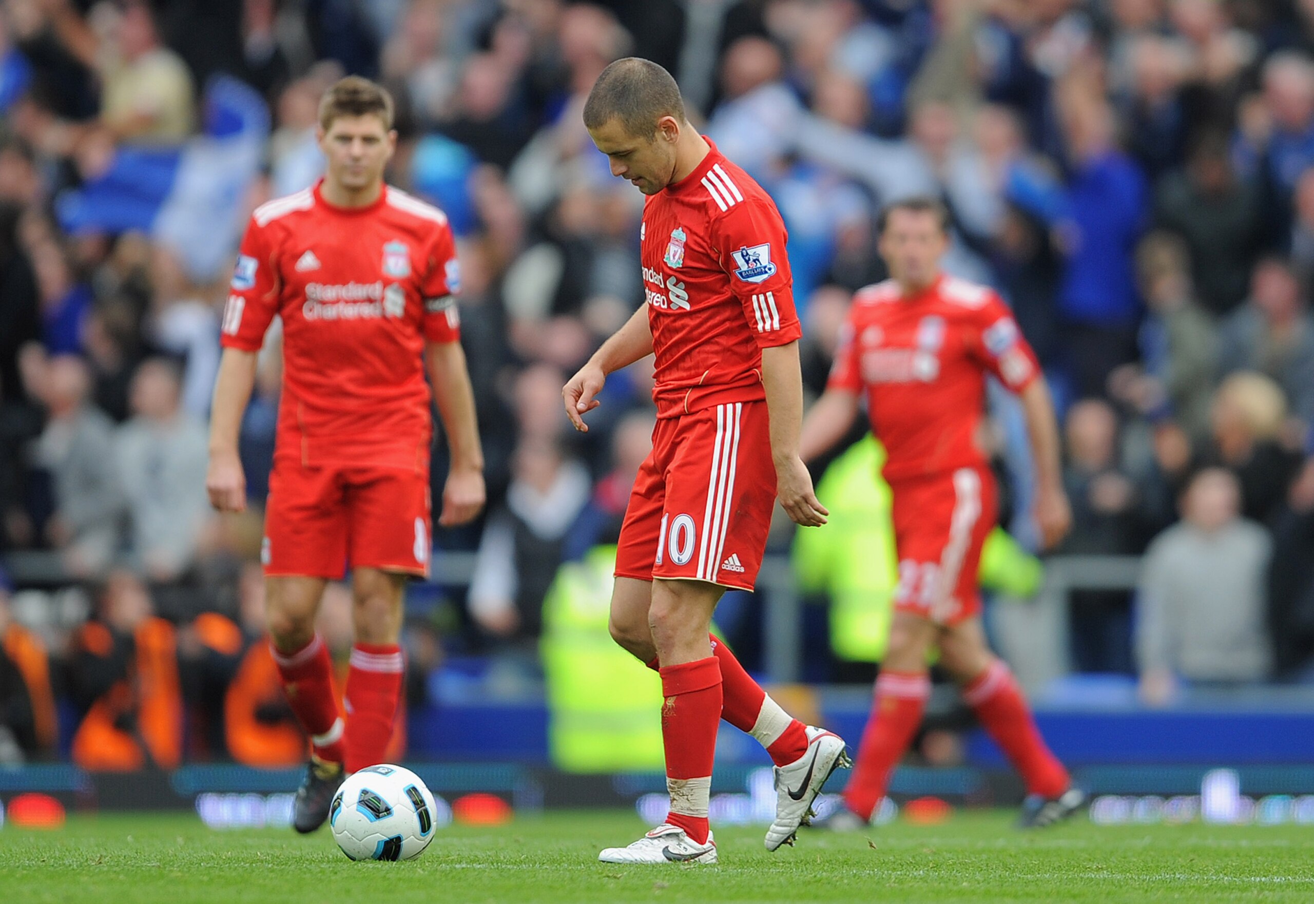 LIVERPOOL, ENGLAND - OCTOBER 17: Joe Cole and Steven Gerrard of Liverpool look dejected after the 2nd Everton goal during the Barclays Premier League match between Everton and Liverpool at Goodison Park on October 17, 2010 in Liverpool, England.  (Photo b