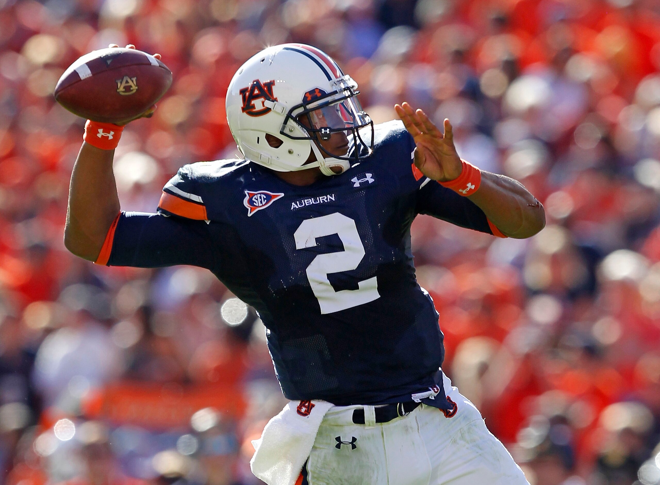 AUBURN, AL - OCTOBER 16:  Quarterback Cam Newton #2 of the Auburn Tigers throws a pass during the game against the Arkansas Razorbacks at Jordan-Hare Stadium on October 16, 2010 in Auburn, Alabama.  (Photo by Mike Zarrilli/Getty Images)