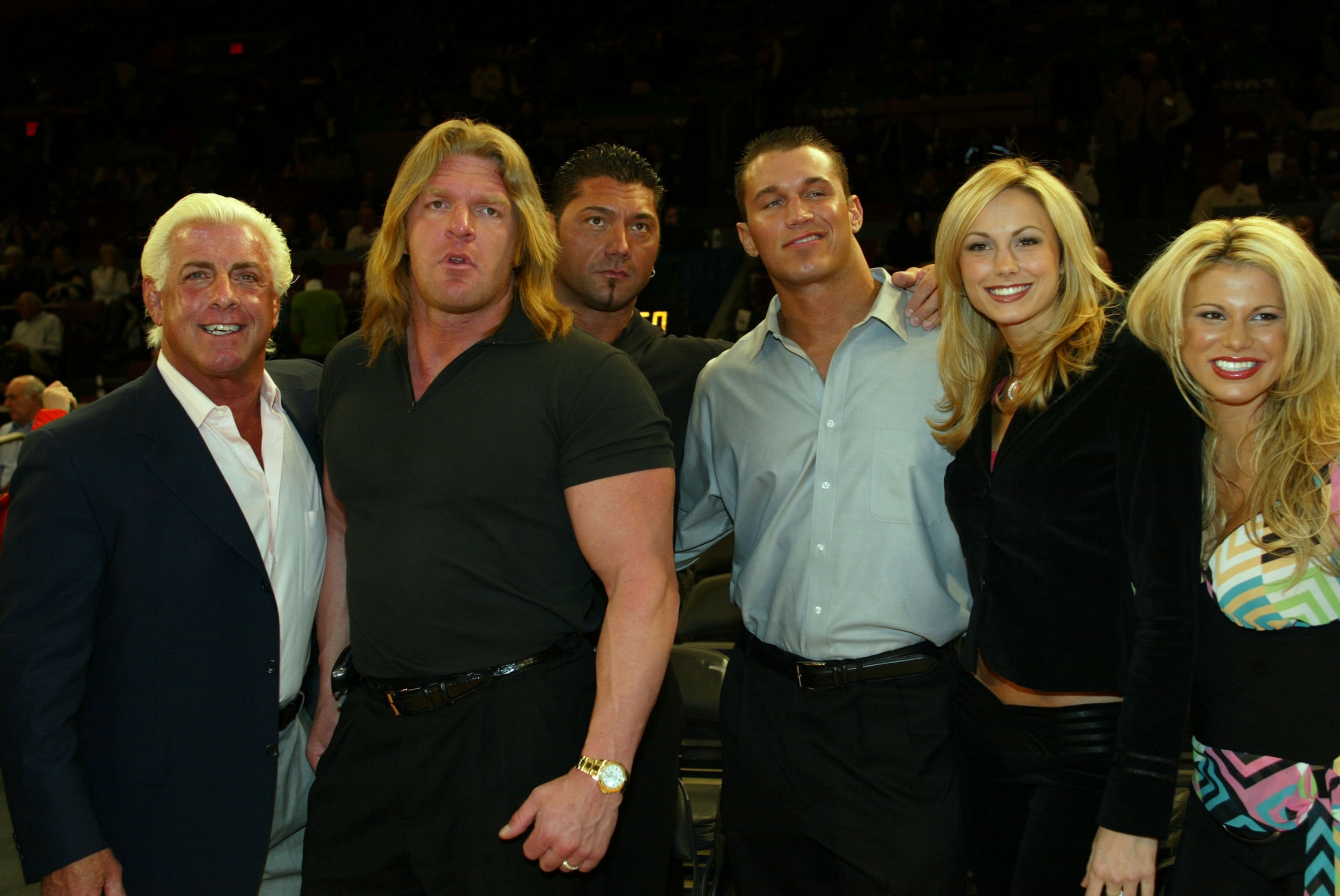 NEW YORK - MARCH 9: WWE wrestlers (L-R) Ric Flair, Triple H, Batista, Randy Orton, Stacy Kiebler & Miss Jackie attend the New York Knicks v Boston Celtics NBA game March 9, 2004 at Madison Square Garden in New York City. (Photo by Ray Amati/Getty Imag NEW YORK - MARCH 9: WWE wrestlers (L-R) Ric Flair, Triple H, Batista, Randy Orton, Stacy Kiebler & Miss Jackie attend the New York Knicks v Boston Celtics NBA game March 9, 2004 at Madison Square Garden in New York City. (Photo by Ray Amati/Getty Imag