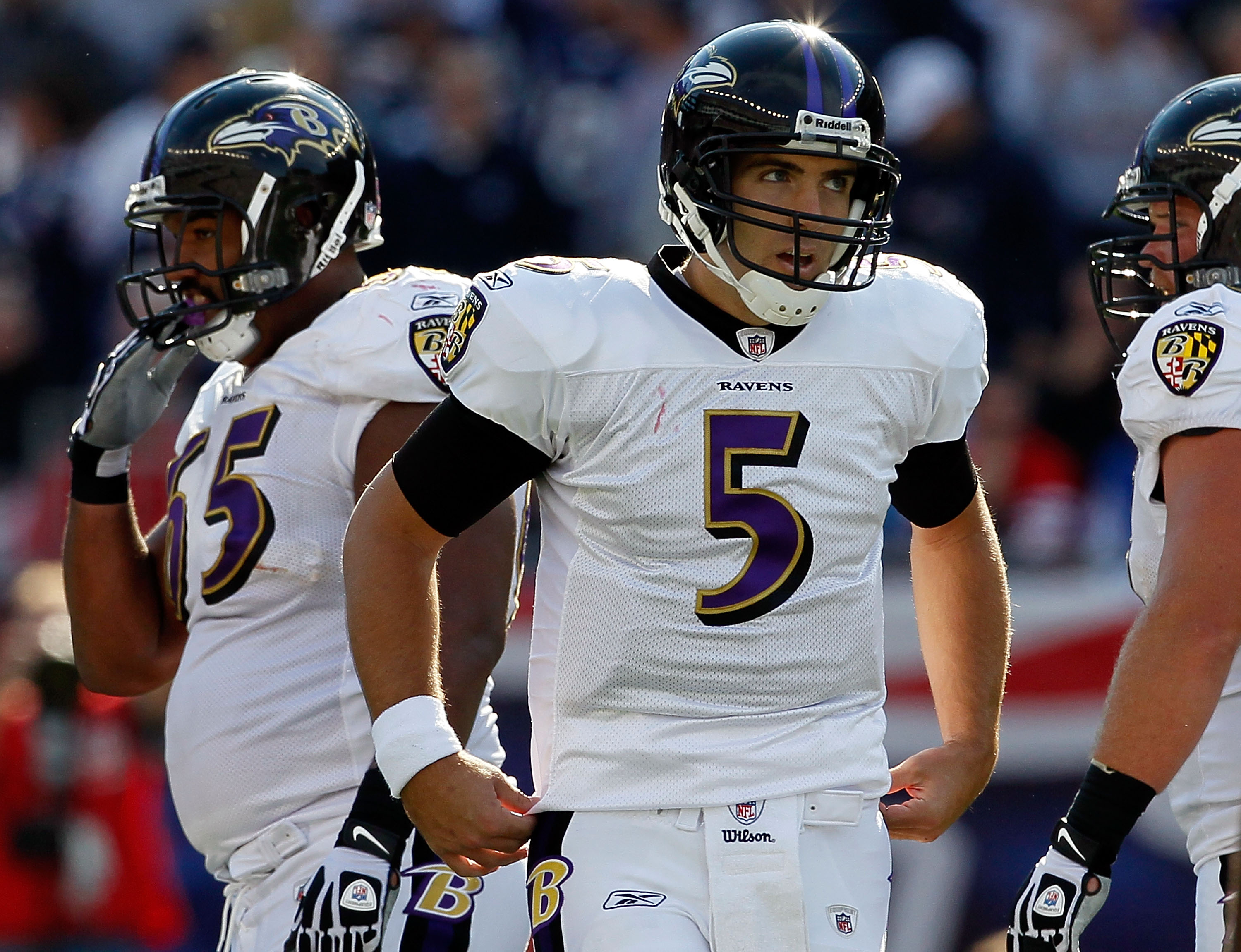 FOXBORO, MA - OCTOBER 17:  Joe Flacco #5 of the Baltimore Ravens takes a breather against the New England Patriots during a game at  at Gillette Stadium on October 17, 2010 in Foxboro, Massachusetts. (Photo by Jim Rogash/Getty Images)