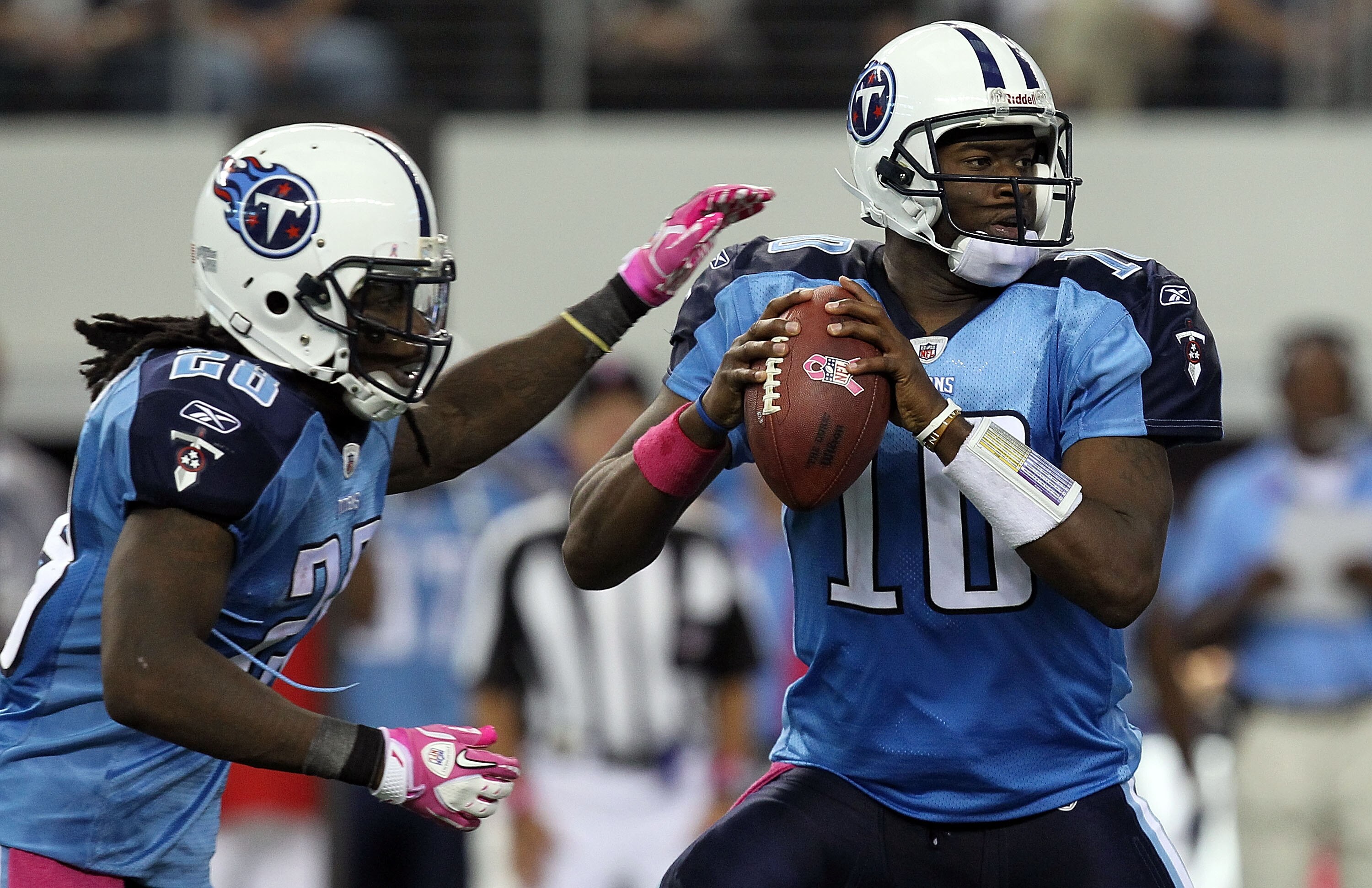 ARLINGTON, TX - OCTOBER 10:  Quarterback Vince Young #10 of the Tennessee Titans drops back to pass against the Dallas Cowboys at Cowboys Stadium on October 10, 2010 in Arlington, Texas.  (Photo by Ronald Martinez/Getty Images)