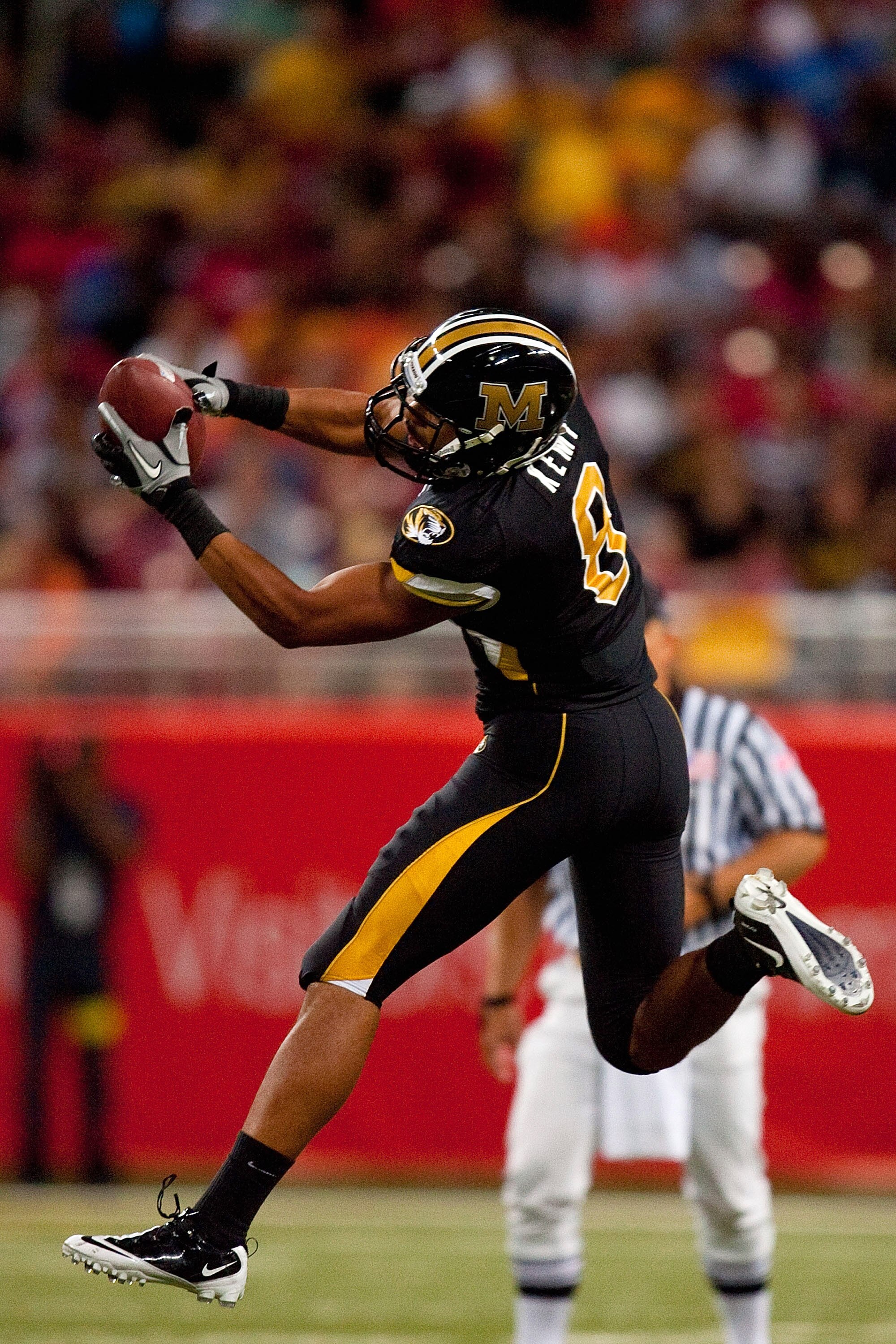 ST. LOUIS - SEPTEMBER 4: Wes Kemp #8 of the University of Missouri Tigers hauls in a pass against the University of Illinois Fighting Illini during the State Farm Arch Rivalry game on September 4, 2010 at the Edward Jones Dome in St. Louis, Missouri. The