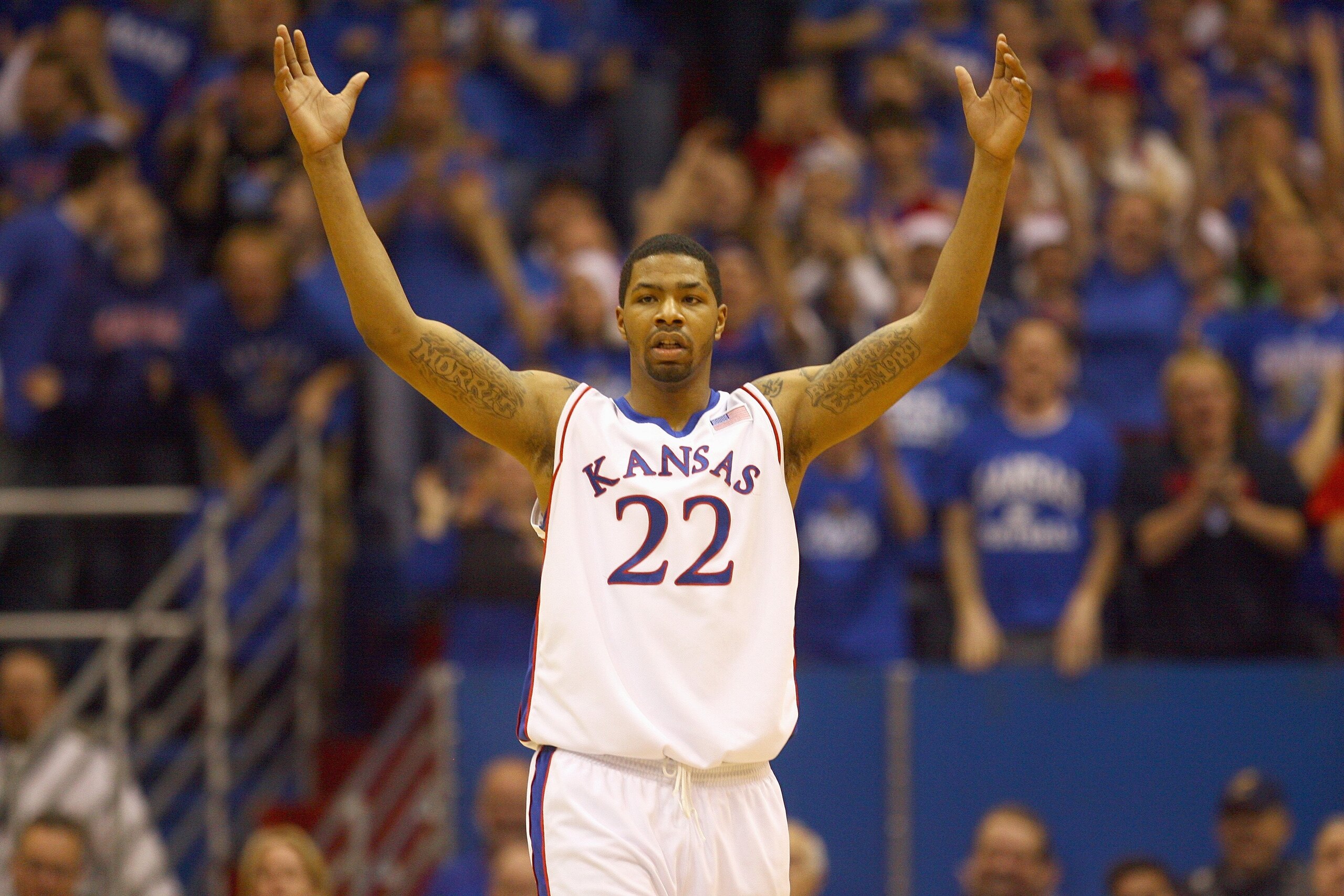 LAWRENCE, KS - DECEMBER 19: Marcus Morris #22 of the Kansas Jayhawks motions on the court during the game against the Michigan Wolverines on December 19, 2009 at Allen Fieldhouse in Lawrence, Kansas. (Photo by Jamie Squire/Getty Images) LAWRENCE, KS - DECEMBER 19: Marcus Morris #22 of the Kansas Jayhawks motions on the court during the game against the Michigan Wolverines on December 19, 2009 at Allen Fieldhouse in Lawrence, Kansas. (Photo by Jamie Squire/Getty Images)