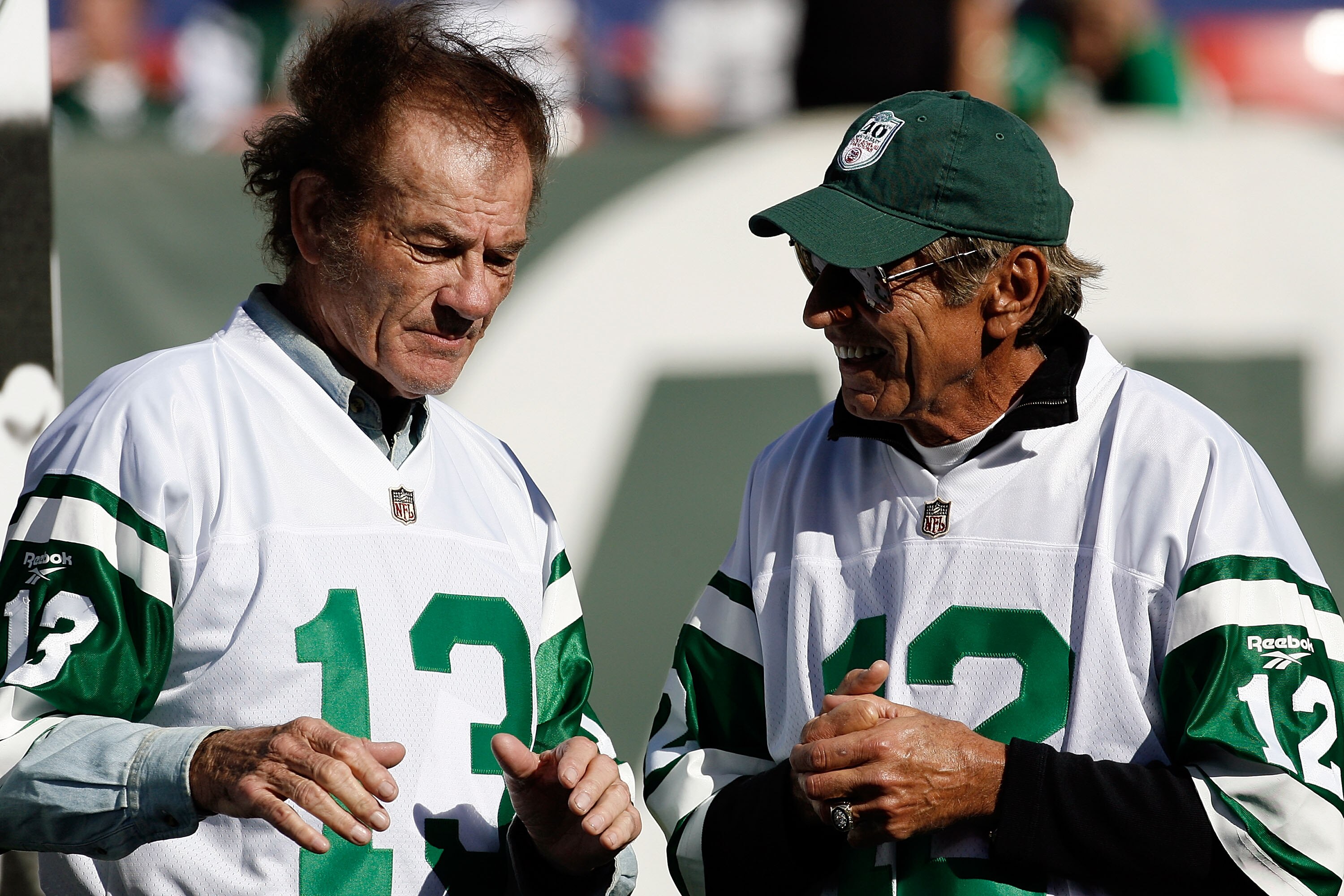 EAST RUTHERFORD, NJ - OCTOBER 26:  Former Jets quarterback Joe Namath chats with former Jets wide receiver Don Maynard (L) during halftime festivities celebrating the 40th anniversary of the Jets' win over the Colts in Super Bowl III during the game betwe