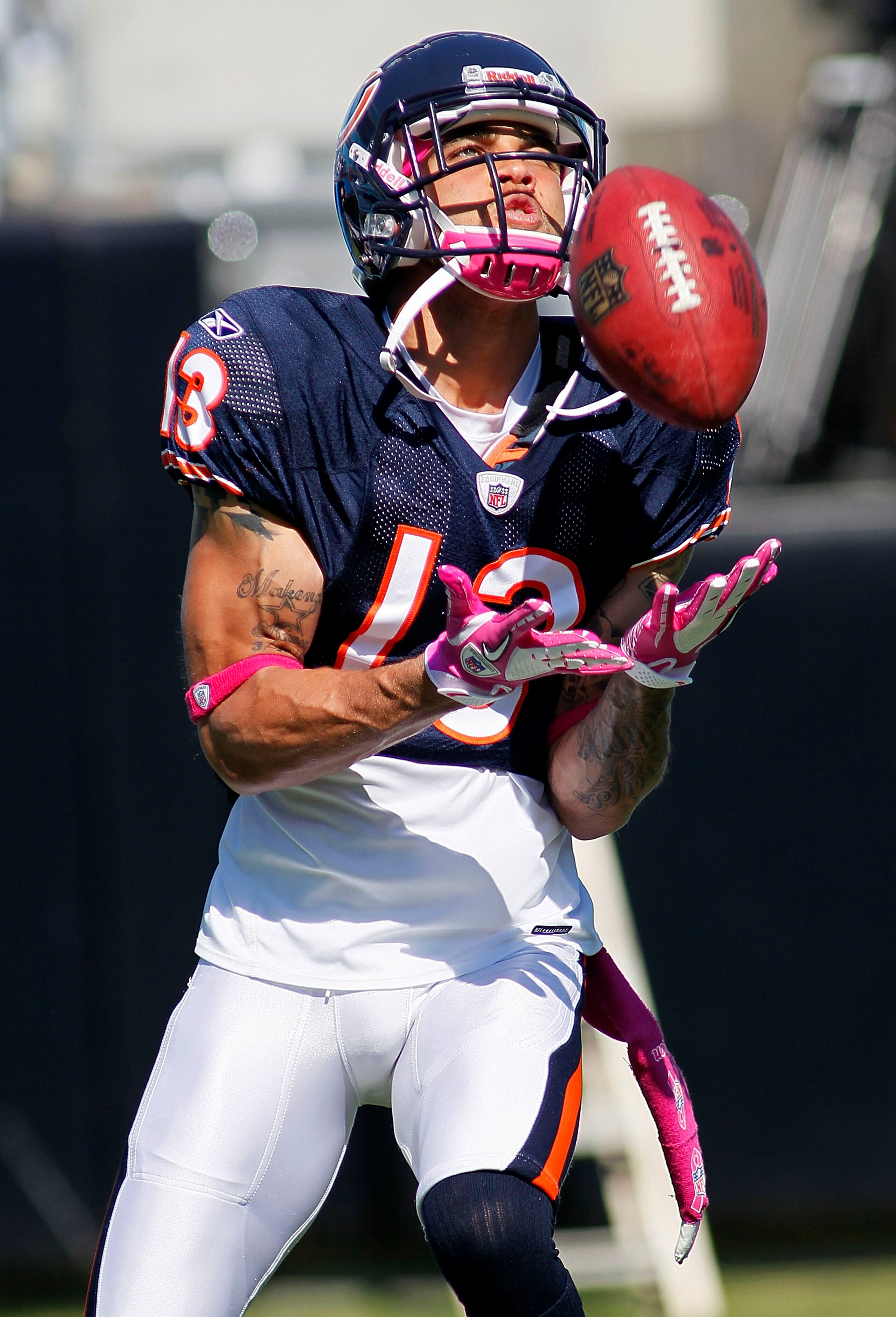 CHARLOTTE, NC - OCTOBER 10: Wide receiver Johnny Knox #13 of the Chicago Bears catches the ball during warm ups prior to the Bears game against the Carolina Panthers at Bank of America Stadium on October 10, 2010 in Charlotte, North Carolina. (Photo by Ge