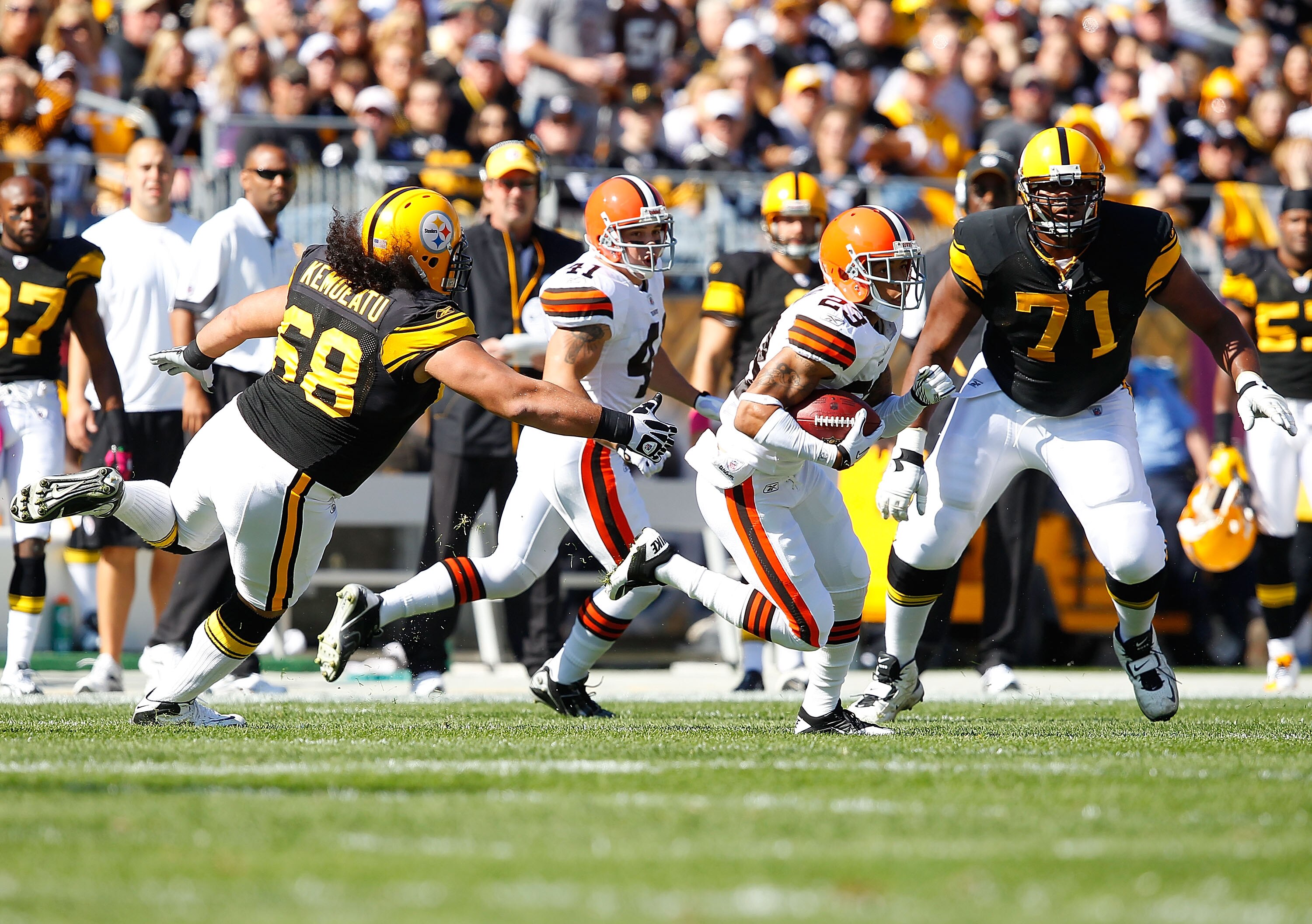 PITTSBURGH - OCTOBER 17:  Joe Haden #23 of the Cleveland Browns runs after intercepting a pass from Ben Roethlisberger #7 of the Pittsburgh Steelers during the game on October 17, 2010 at Heinz Field in Pittsburgh, Pennsylvania.  (Photo by Jared Wickerham