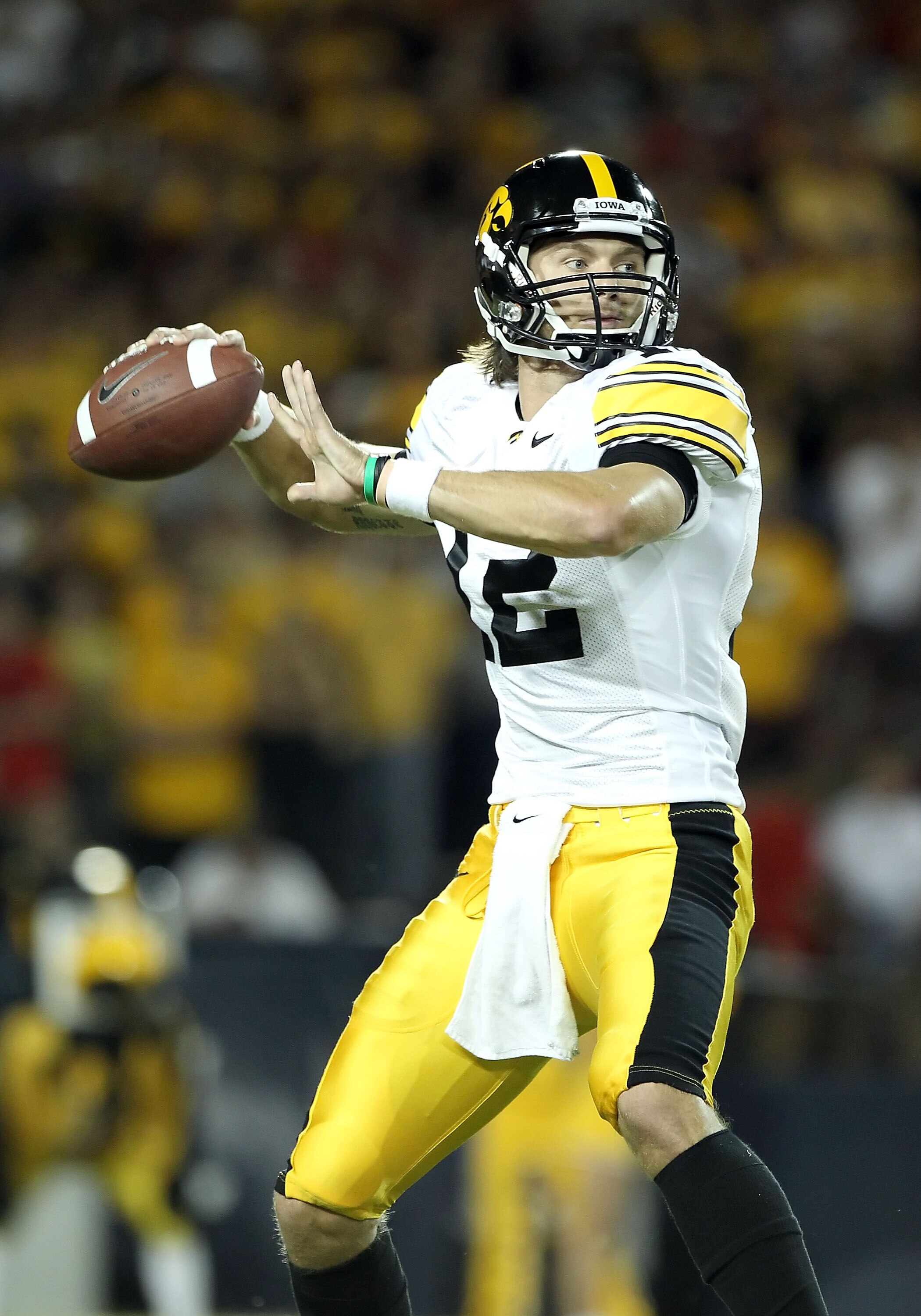 TUCSON, AZ - SEPTEMBER 18:  Quarterback Ricky Stanzi #12 of the Iowa Hawkeyes in action during the college football game against the Arizona Wildcats at Arizona Stadium on September 18, 2010 in Tucson, Arizona.  The Wildcats defeated the Hawkeyes 34-27.