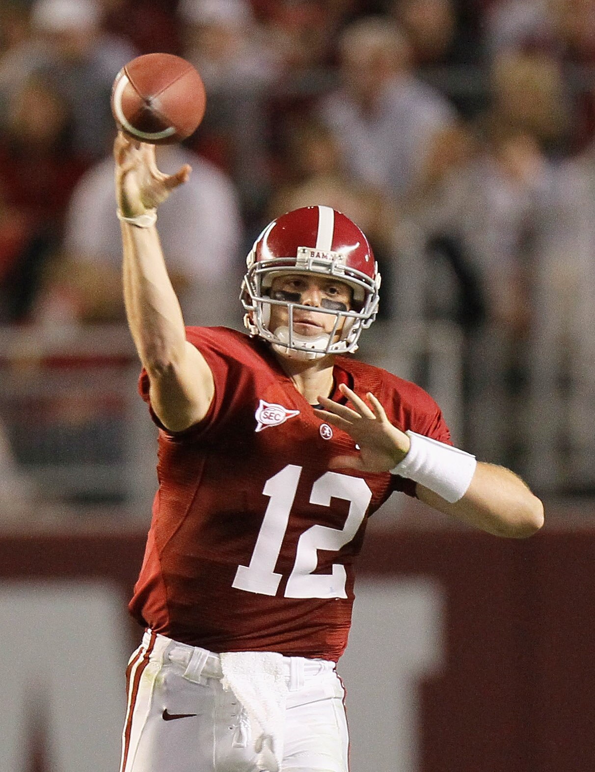 TUSCALOOSA, AL - OCTOBER 16:  Quarterback Greg McElroy #12 of the Alabama Crimson Tide passes upfield against the Ole Miss Rebels at Bryant-Denny Stadium on October 16, 2010 in Tuscaloosa, Alabama.  (Photo by Kevin C. Cox/Getty Images)