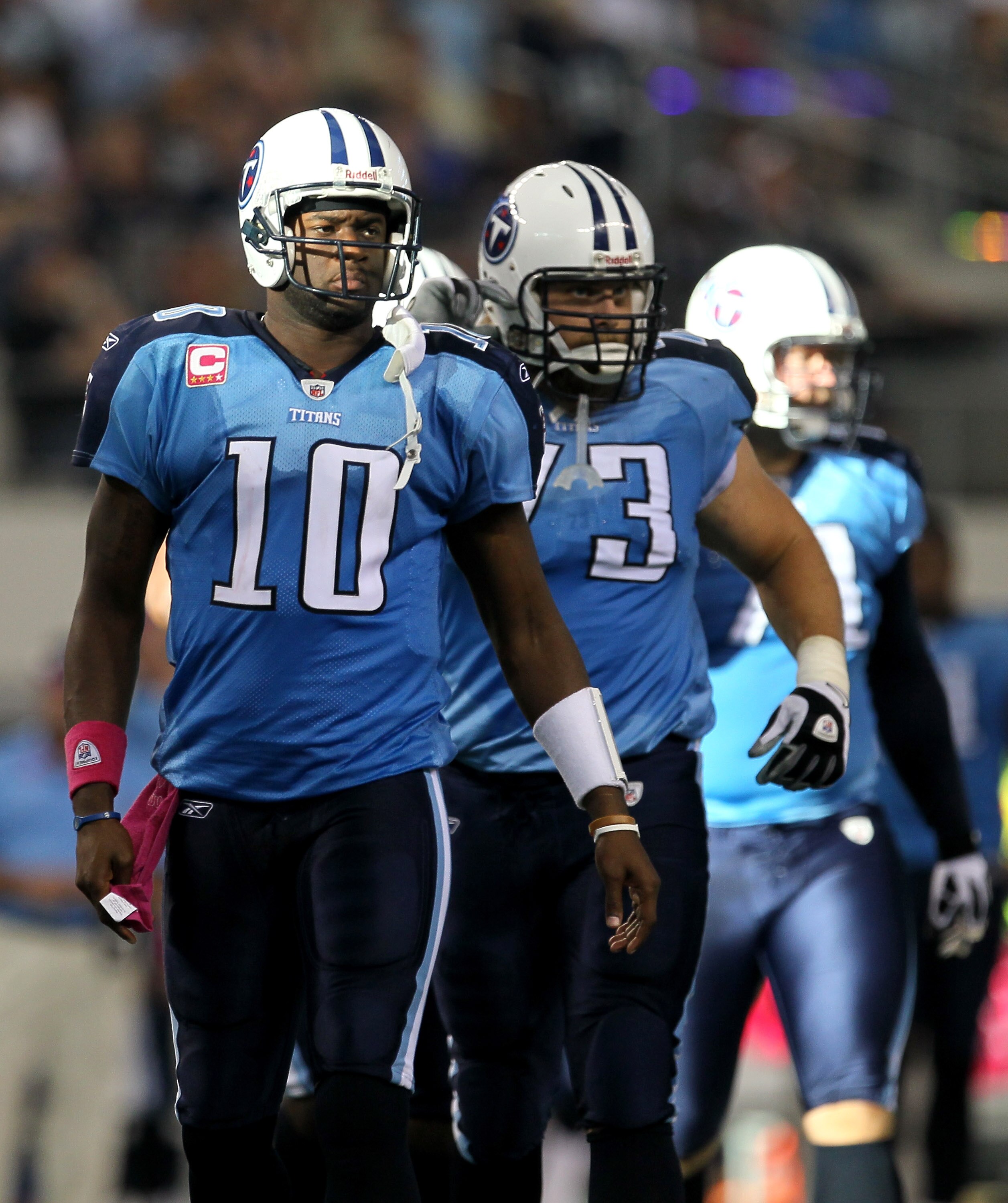 ARLINGTON, TX - OCTOBER 10:  Quarterback Vince Young #10 of the Tennessee Titans leads the offense onto the field after a turnover in the game against the Dallas Cowboys at Cowboys Stadium on October 10, 2010 in Arlington, Texas.   The Titans won 34-27.  
