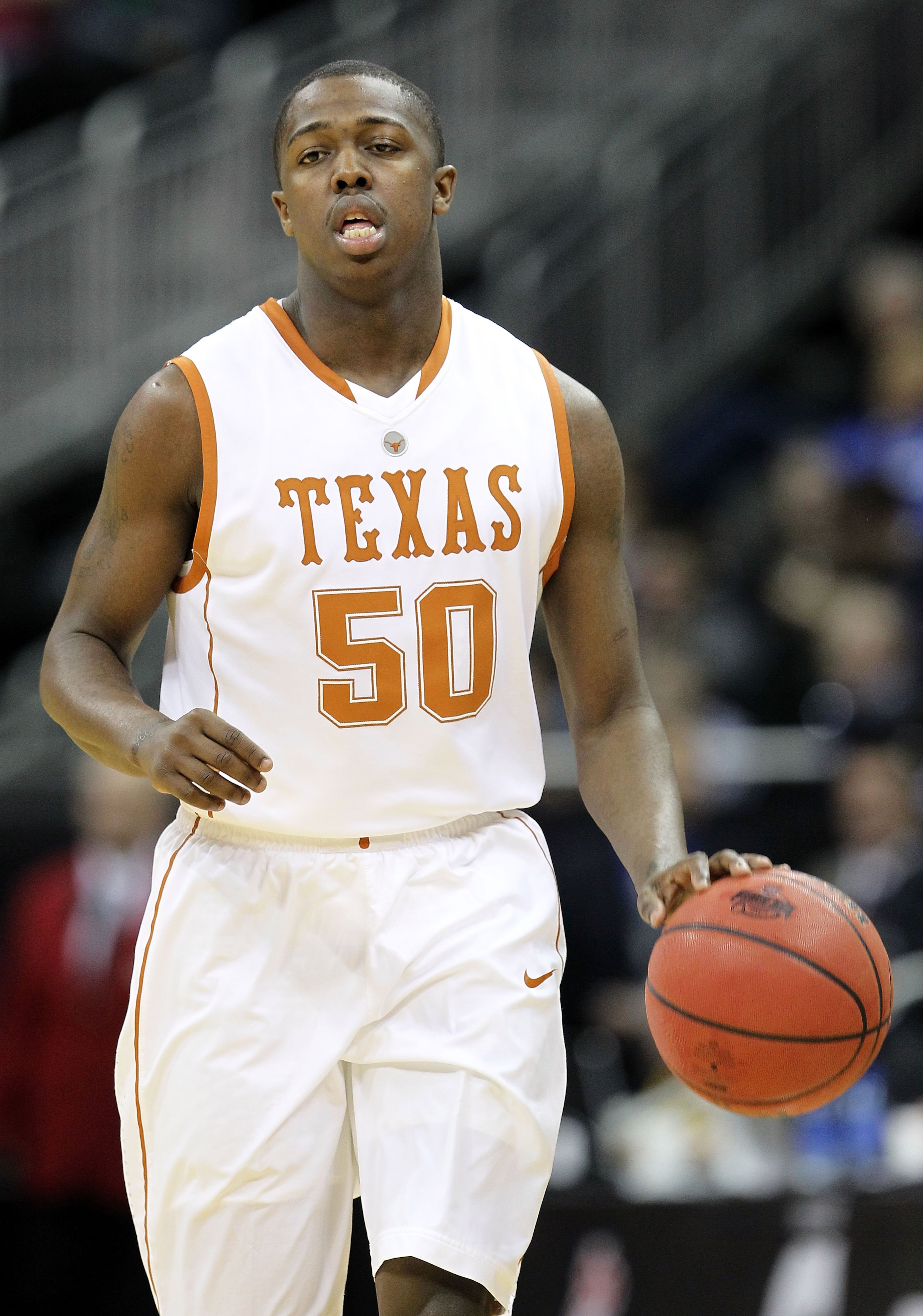KANSAS CITY, MO - MARCH 10:  J'Covan Brown #50 of the Texas Longhorns moves the ball against the Iowa State Cyclones during the first round game of the 2010 Phillips 66 Big 12 Men's Basketball Tournament at the Sprint Center on March 10, 2010 in Kansas Ci