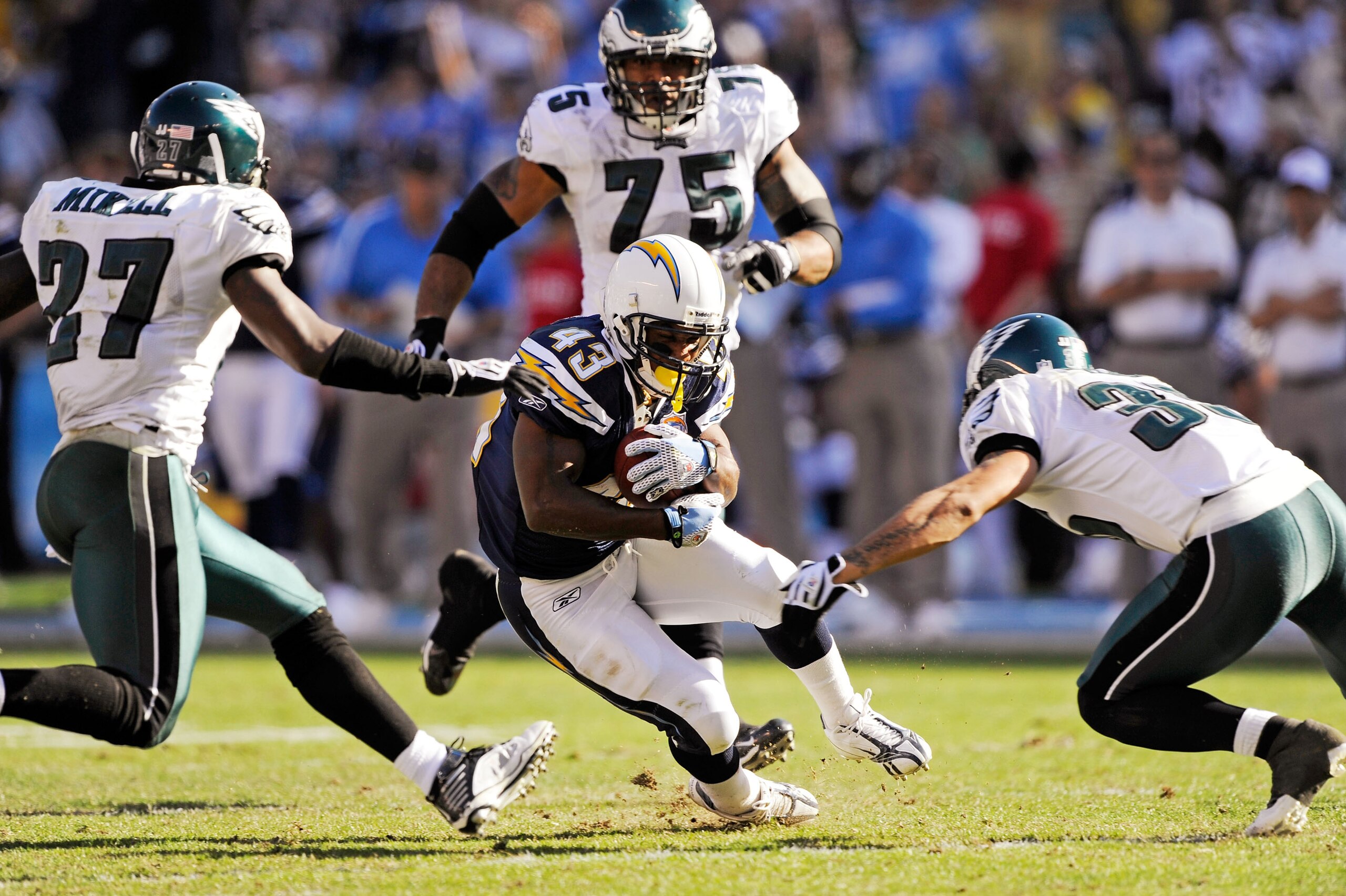 SAN DIEGO - NOVEMBER 15:  Darren Sproles #43 of the San Diego Chargers is surrounded by Philadelphia Eagles defenders during the NFL football game at Qualcomm Stadium on November 15, 2009 in San Diego, California.  (Photo by Kevork Djansezian/Getty Images