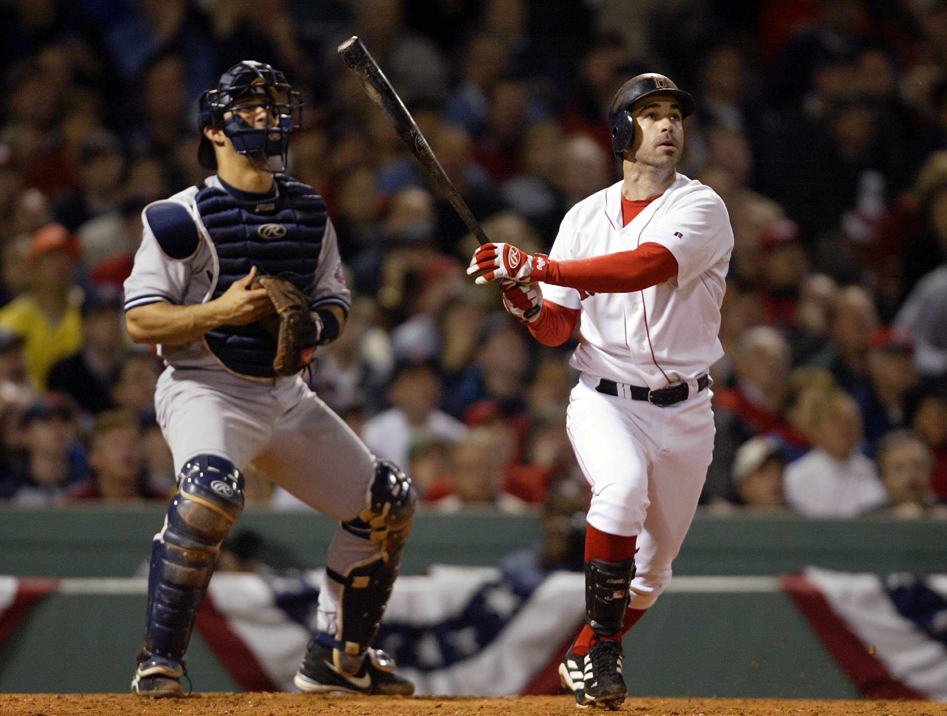 BOSTON - OCTOBER 13:  Todd Walker #12 of the Boston Red Sox hits a home run in the bottom of the fourth inning of Game 4 of the 2003 American League Championship Series against the New York Yankees October 13, 2003 at Fenway Park in Boston, Massachusetts.