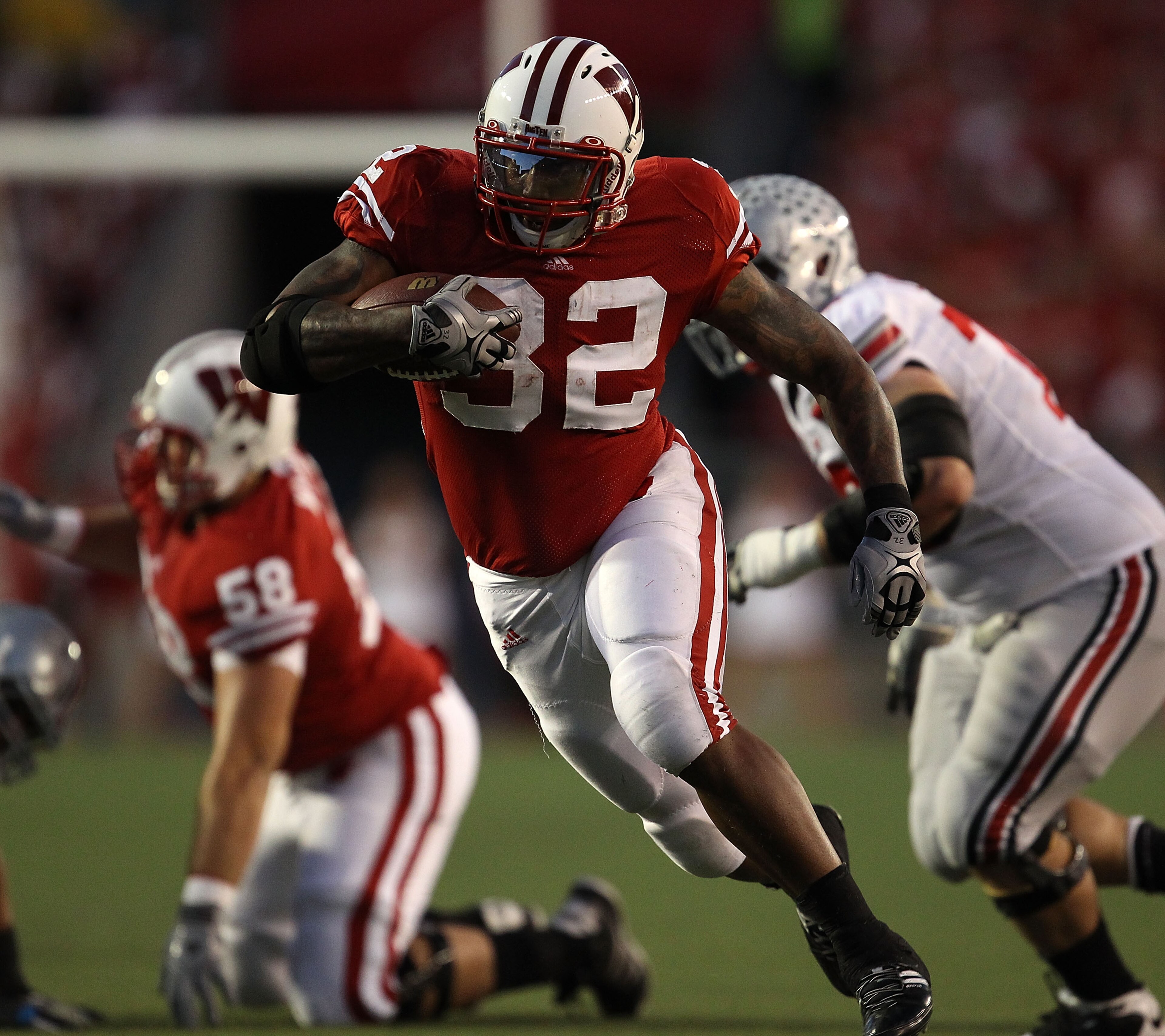 MADISON, WI - OCTOBER 16: John Clay #32 of the Wisconsin Badgers runs for a first down against the Ohio State Buckeyes at Camp Randall Stadium on October 16, 2010 in Madison, Wisconsin. (Photo by Jonathan Daniel/Getty Images) MADISON, WI - OCTOBER 16: John Clay #32 of the Wisconsin Badgers runs for a first down against the Ohio State Buckeyes at Camp Randall Stadium on October 16, 2010 in Madison, Wisconsin. (Photo by Jonathan Daniel/Getty Images)